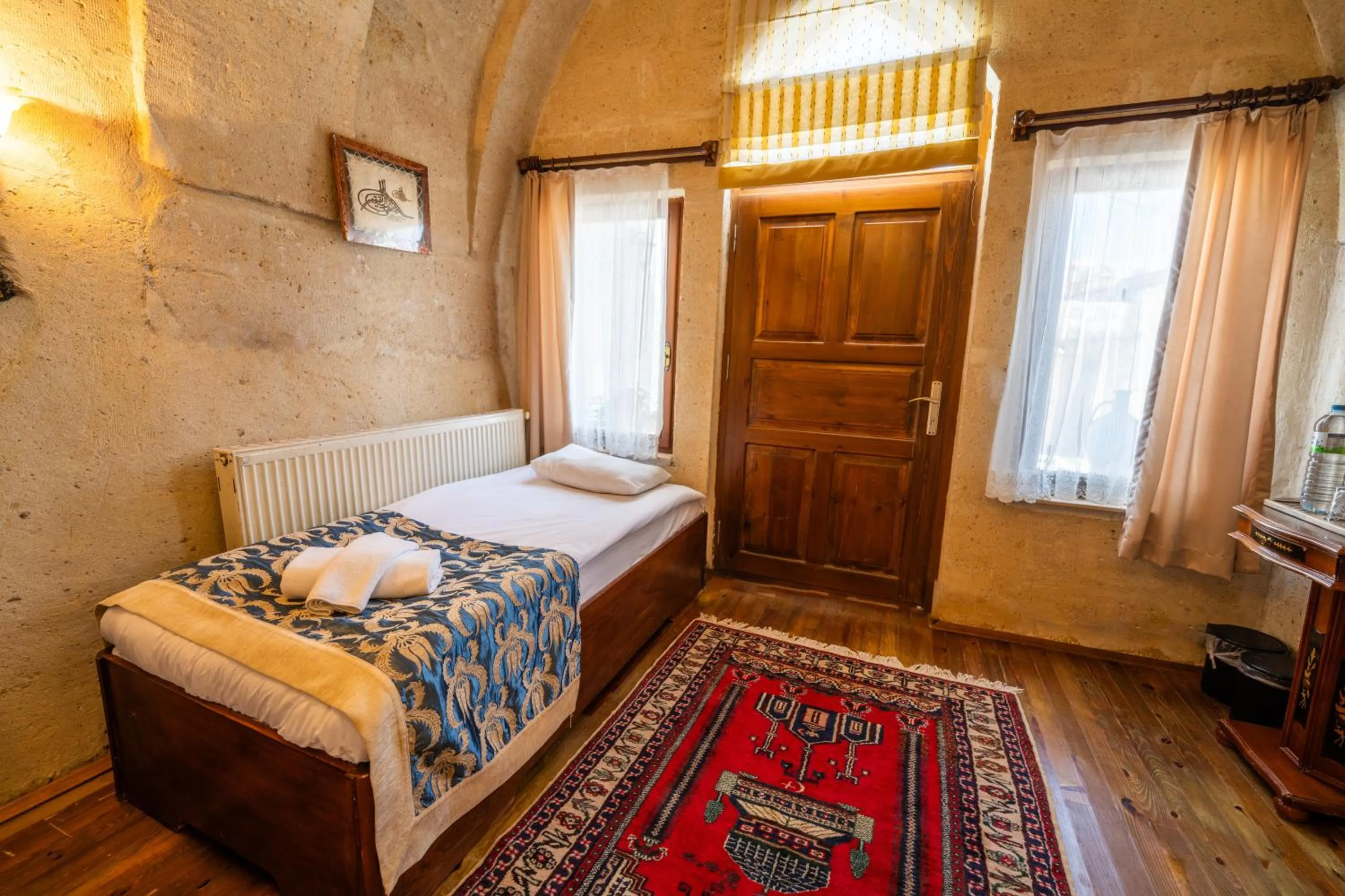 Bed in Asyada Suites Hotel