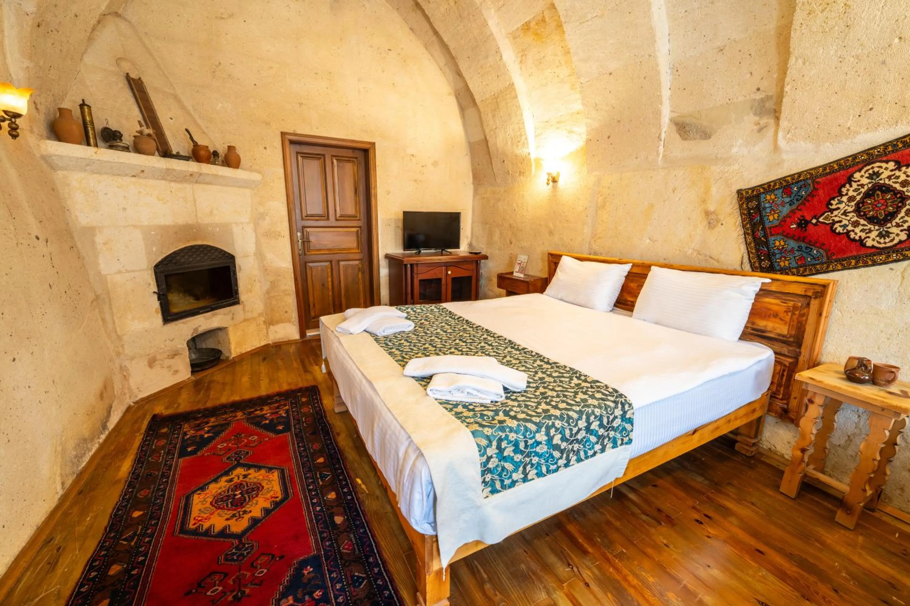 Bed in Asyada Suites Hotel