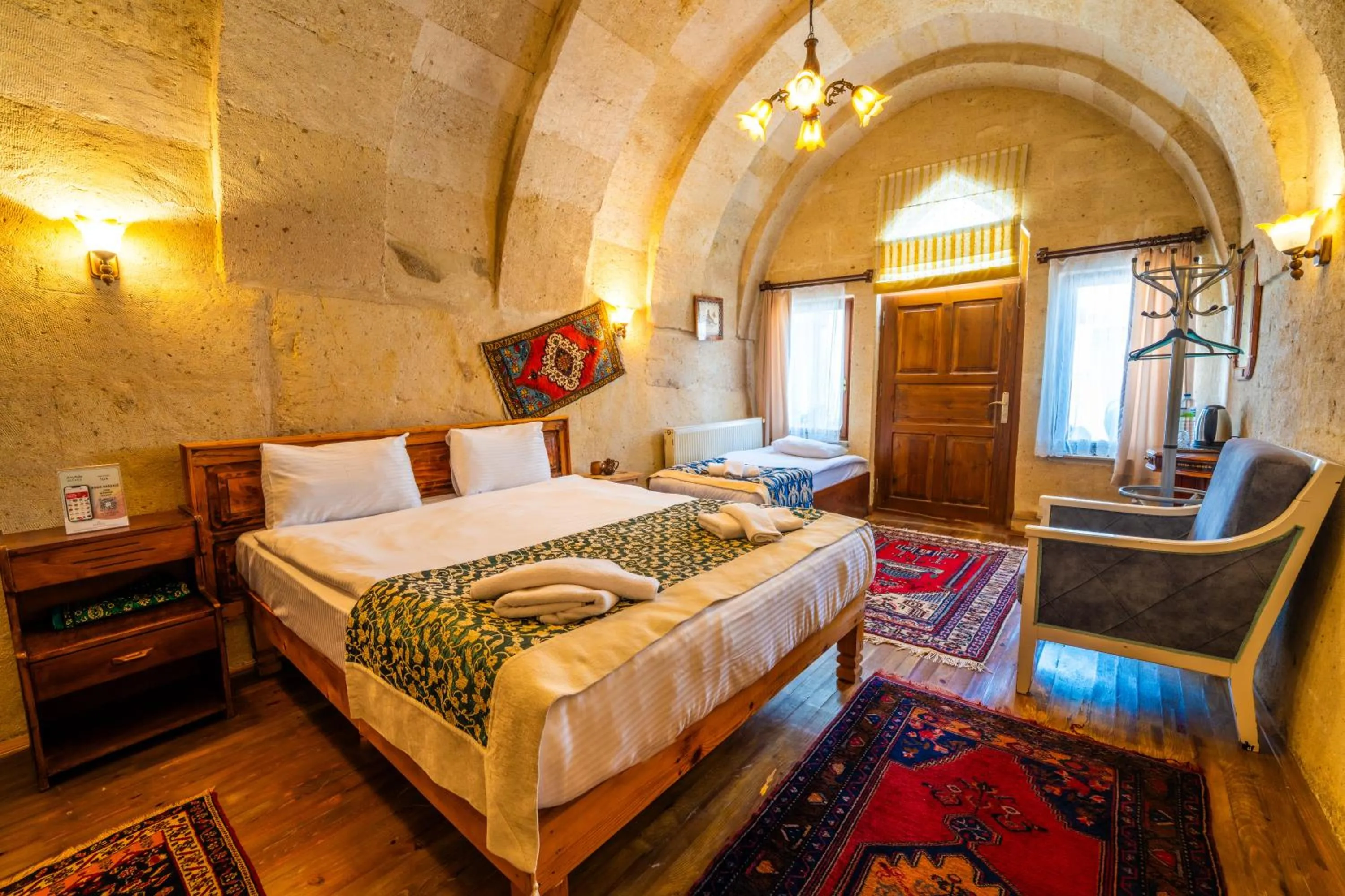 Bed in Asyada Suites Hotel