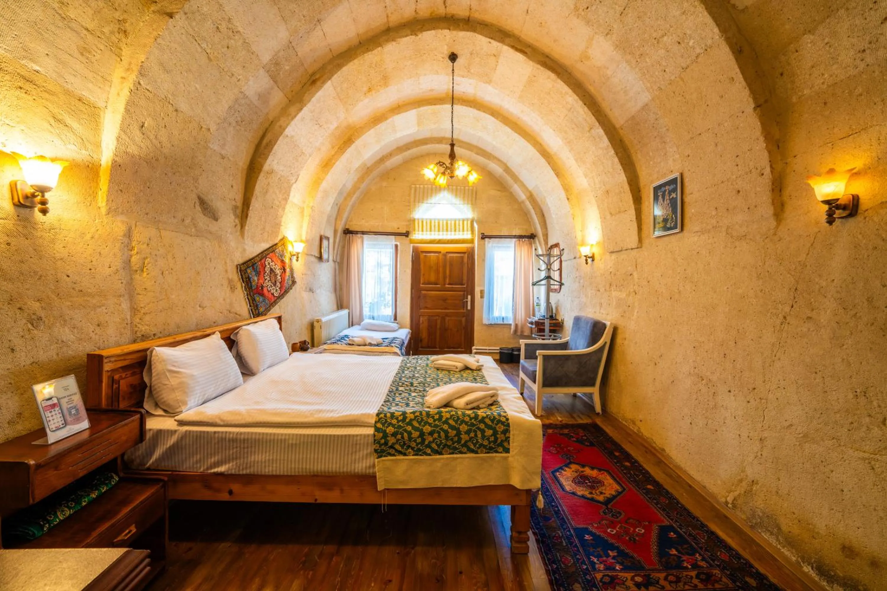 Bed in Asyada Suites Hotel