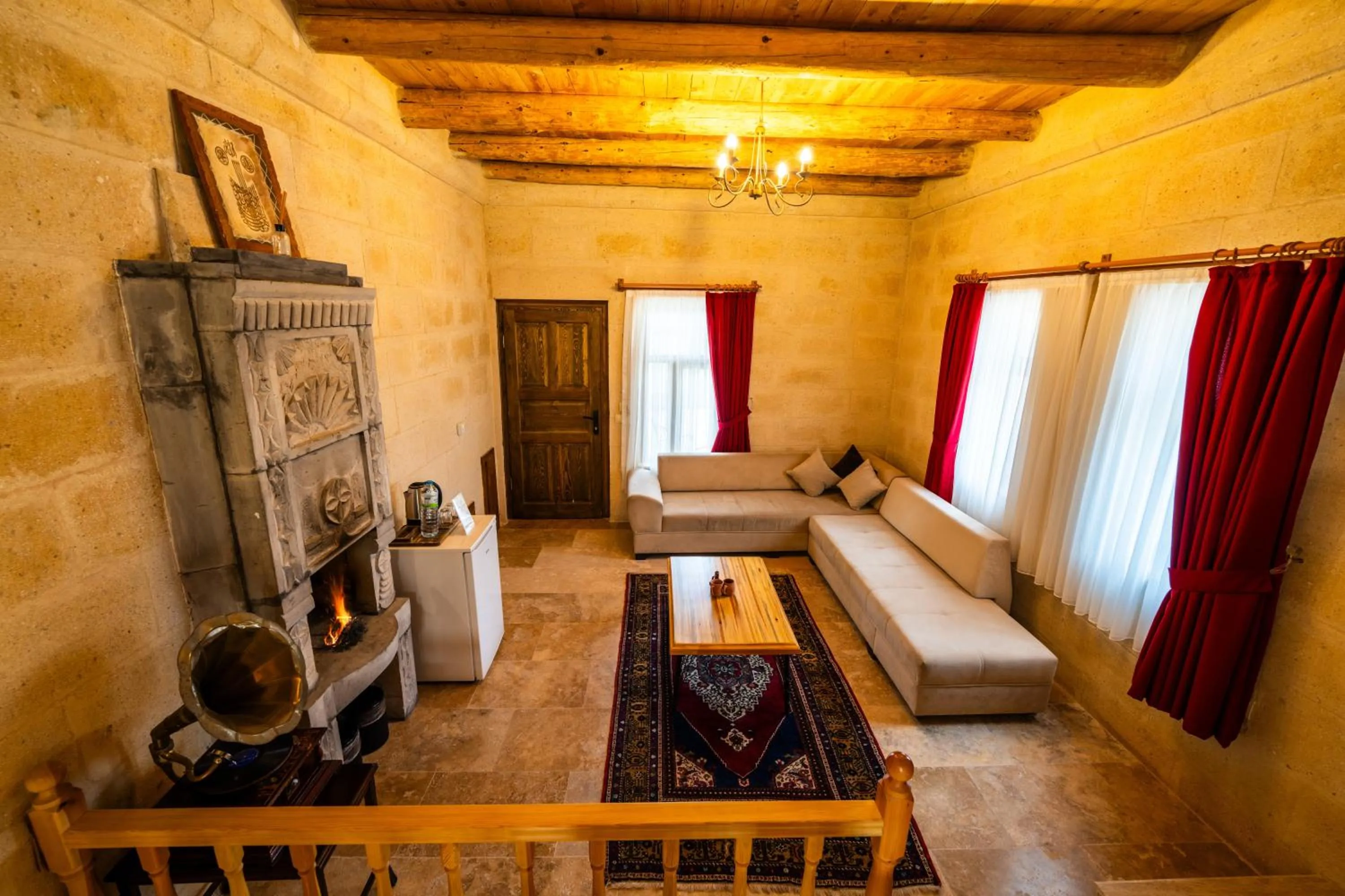 Seating area, Bed in Asyada Suites Hotel