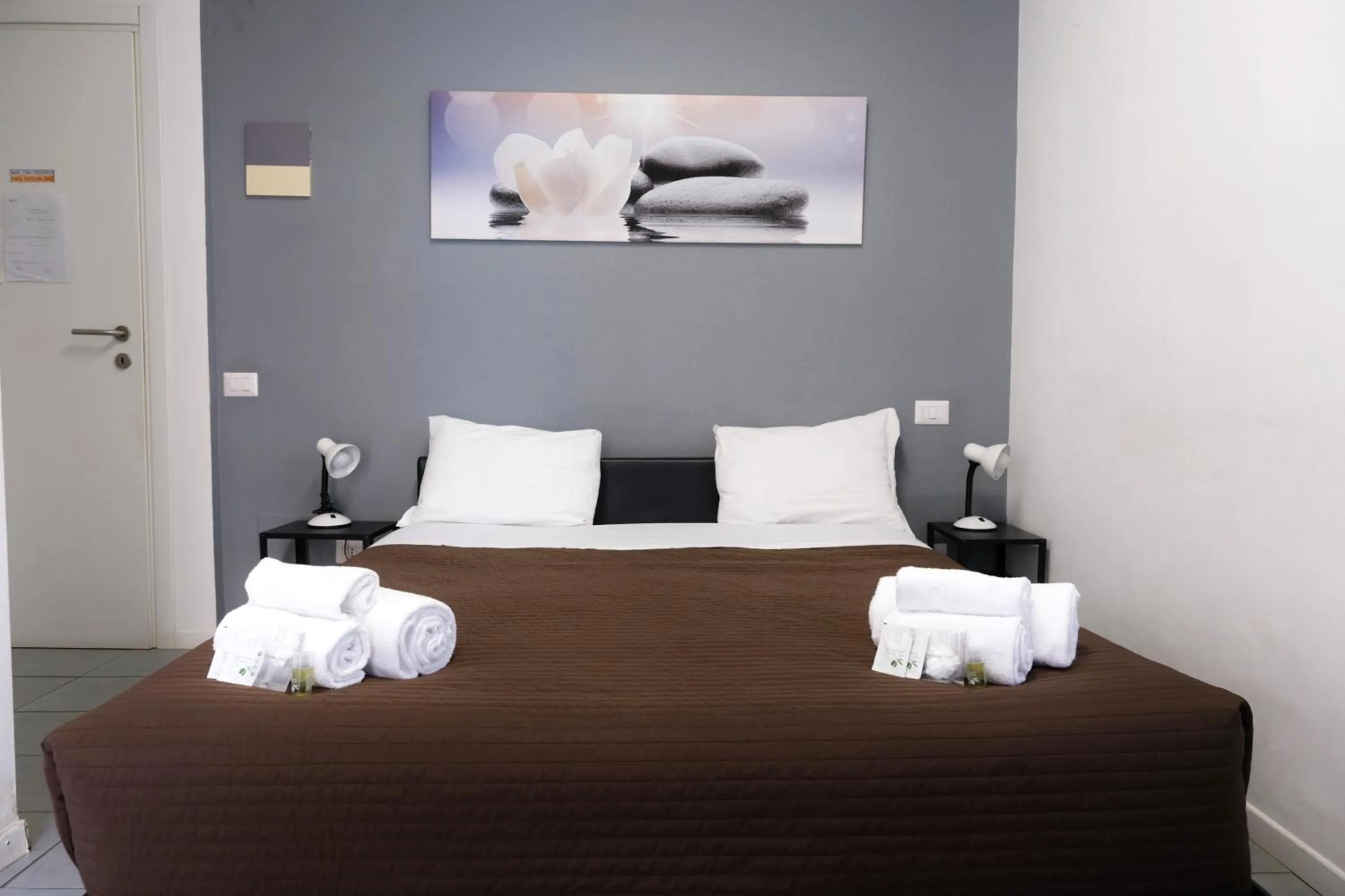 Bed in Vatican Central Suites