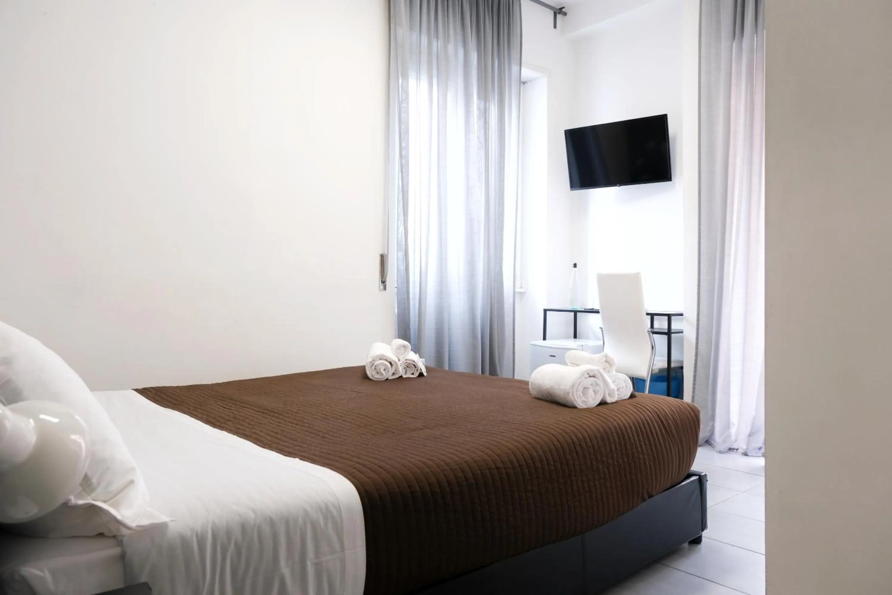 Bed in Vatican Central Suites