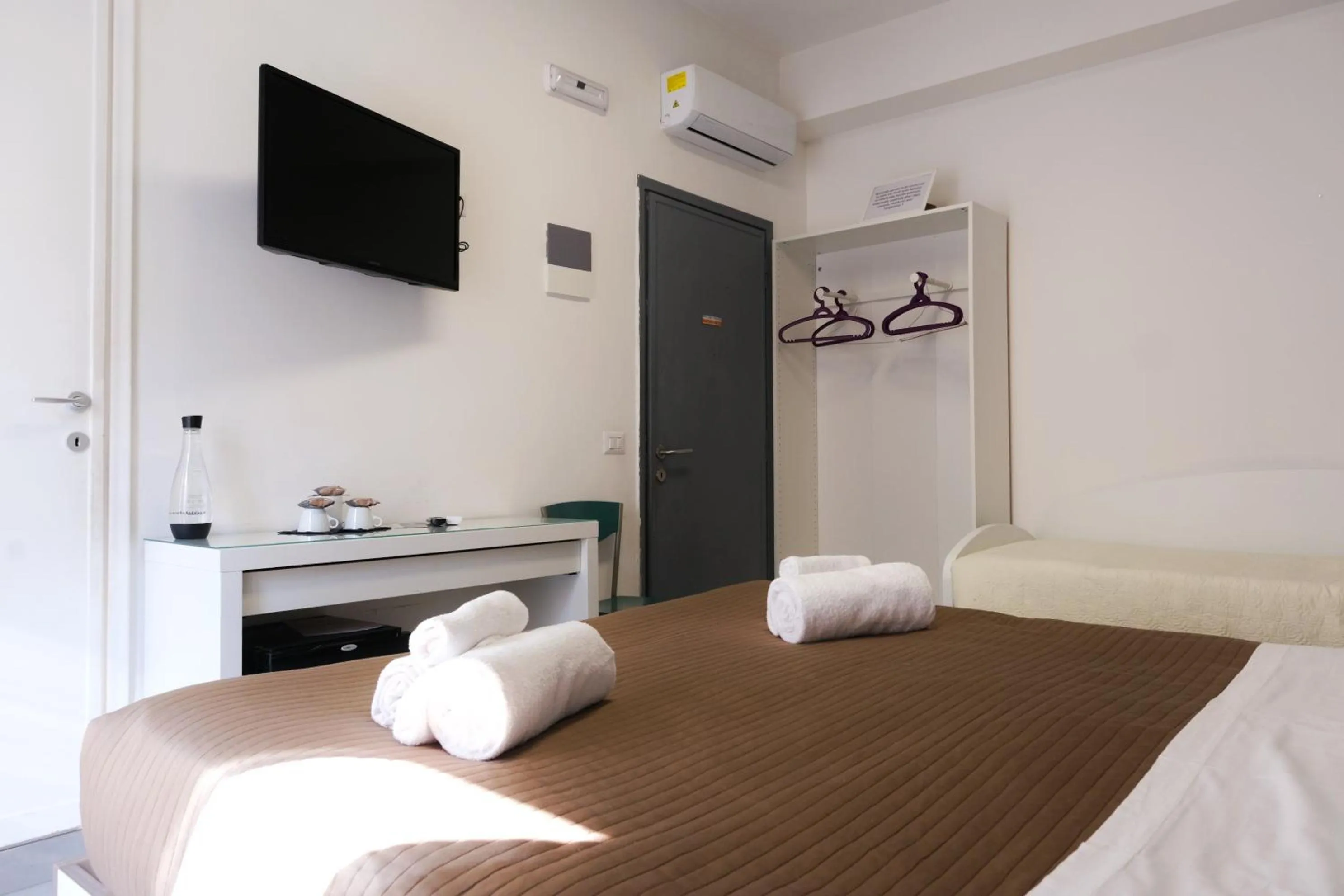 Bed in Vatican Central Suites