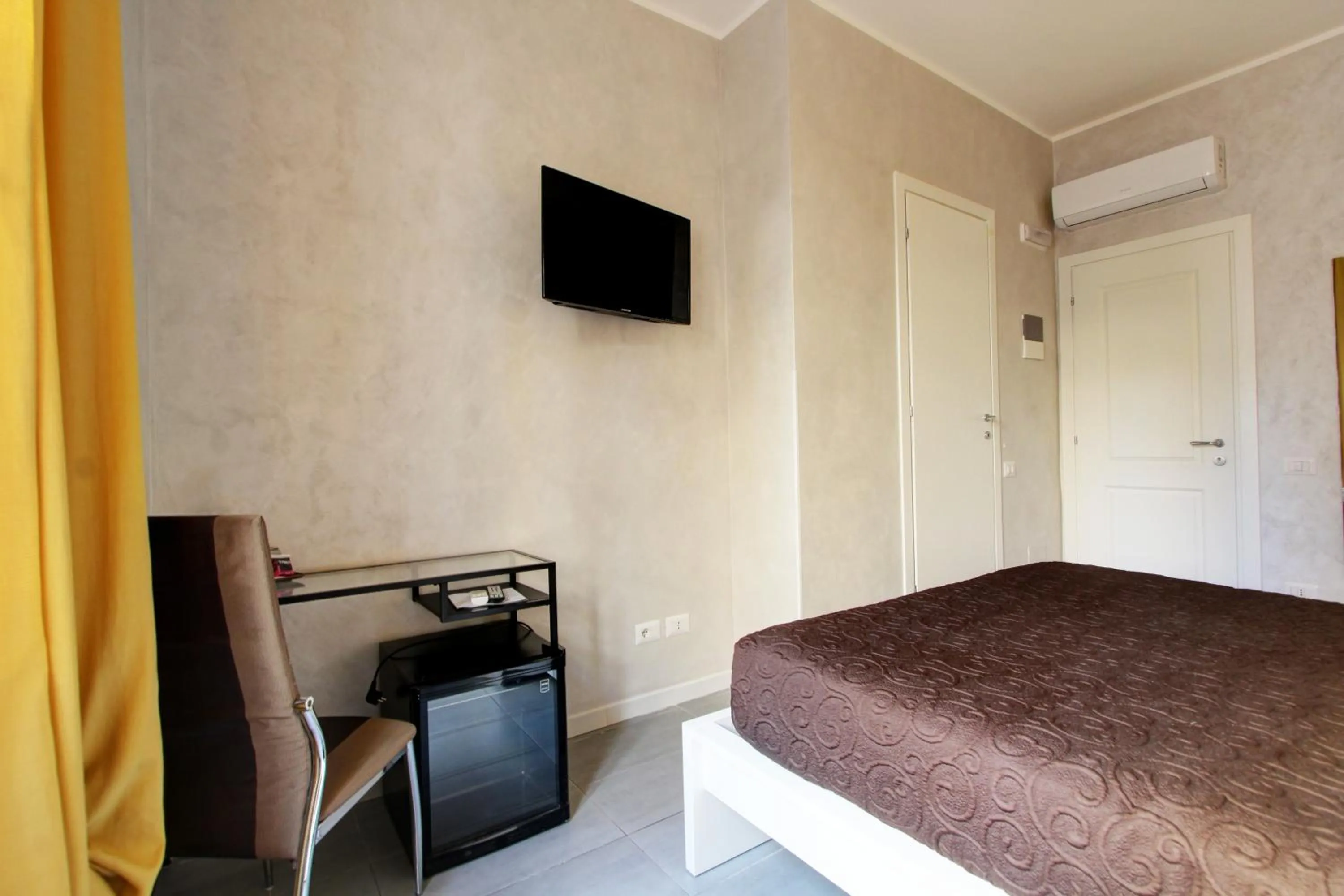 Bed in Vatican Central Suites