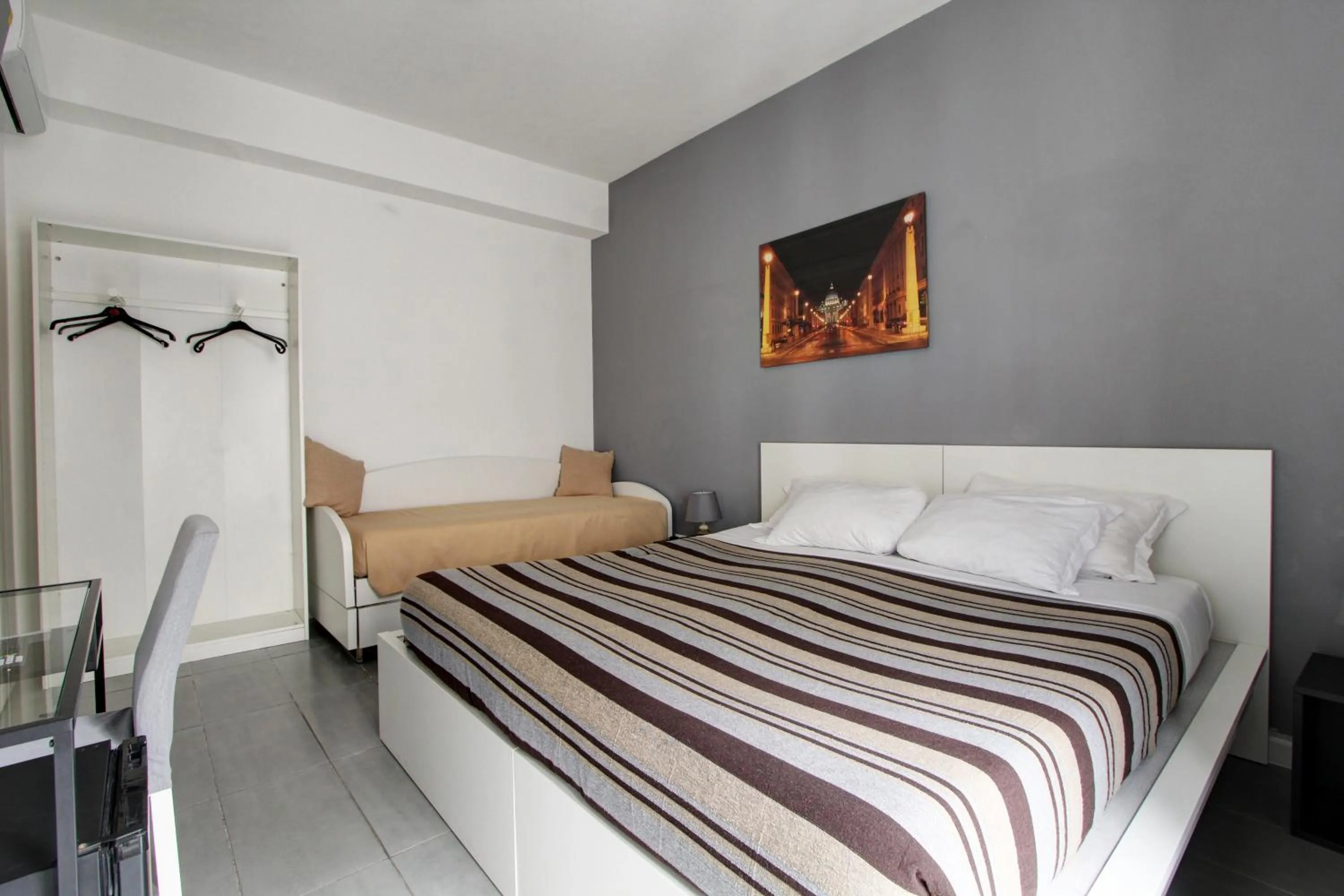 Bed in Vatican Central Suites