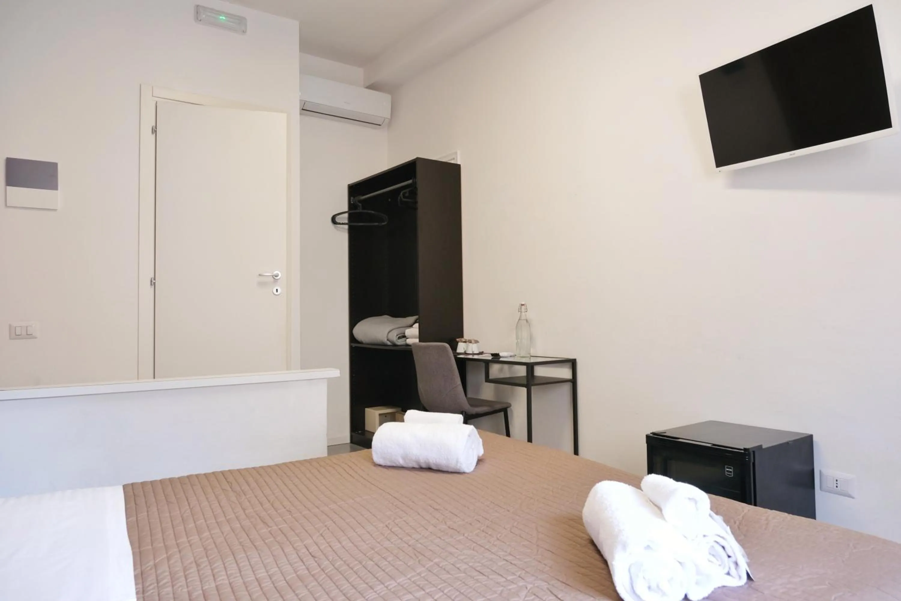 Bed in Vatican Central Suites