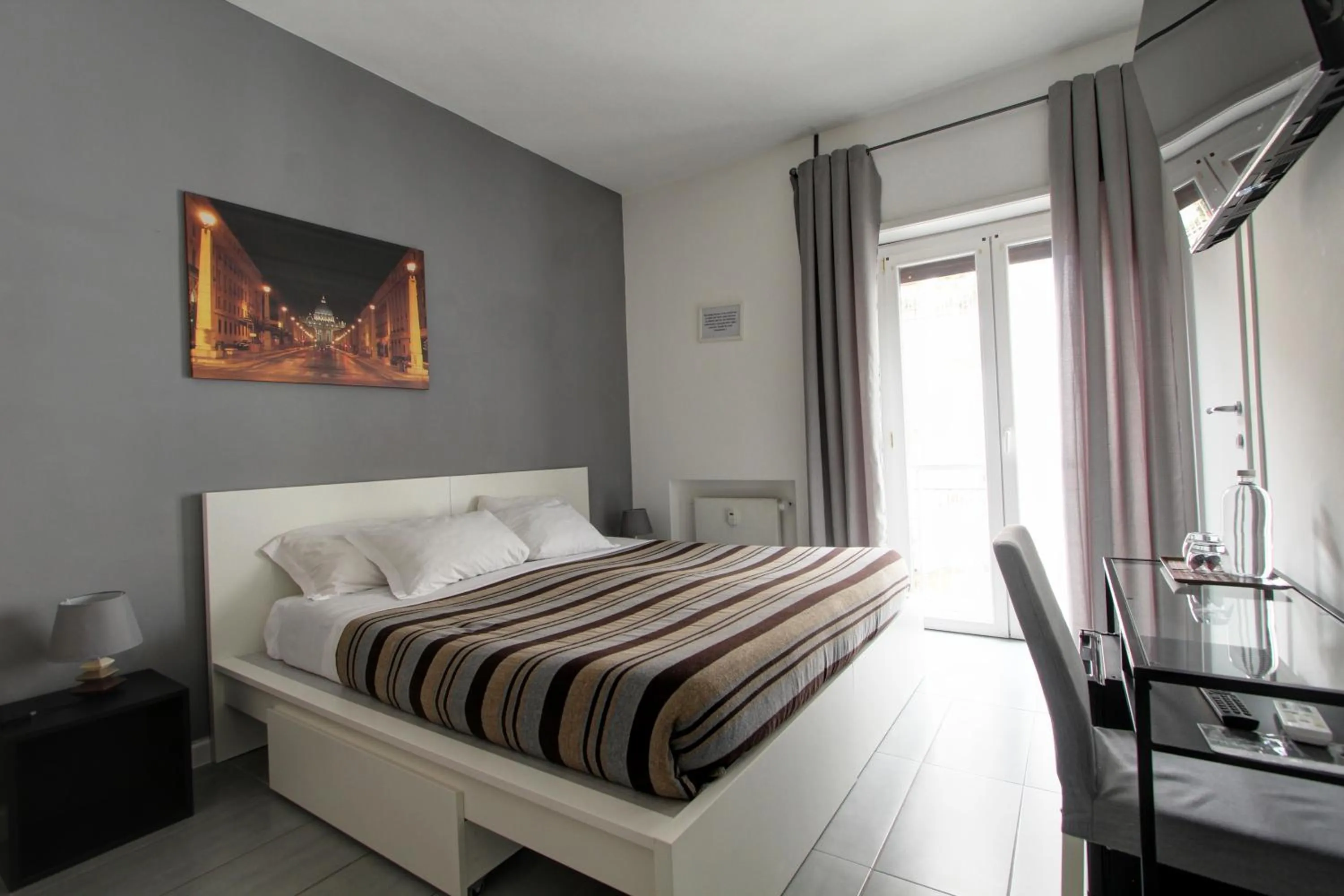 Bed in Vatican Central Suites