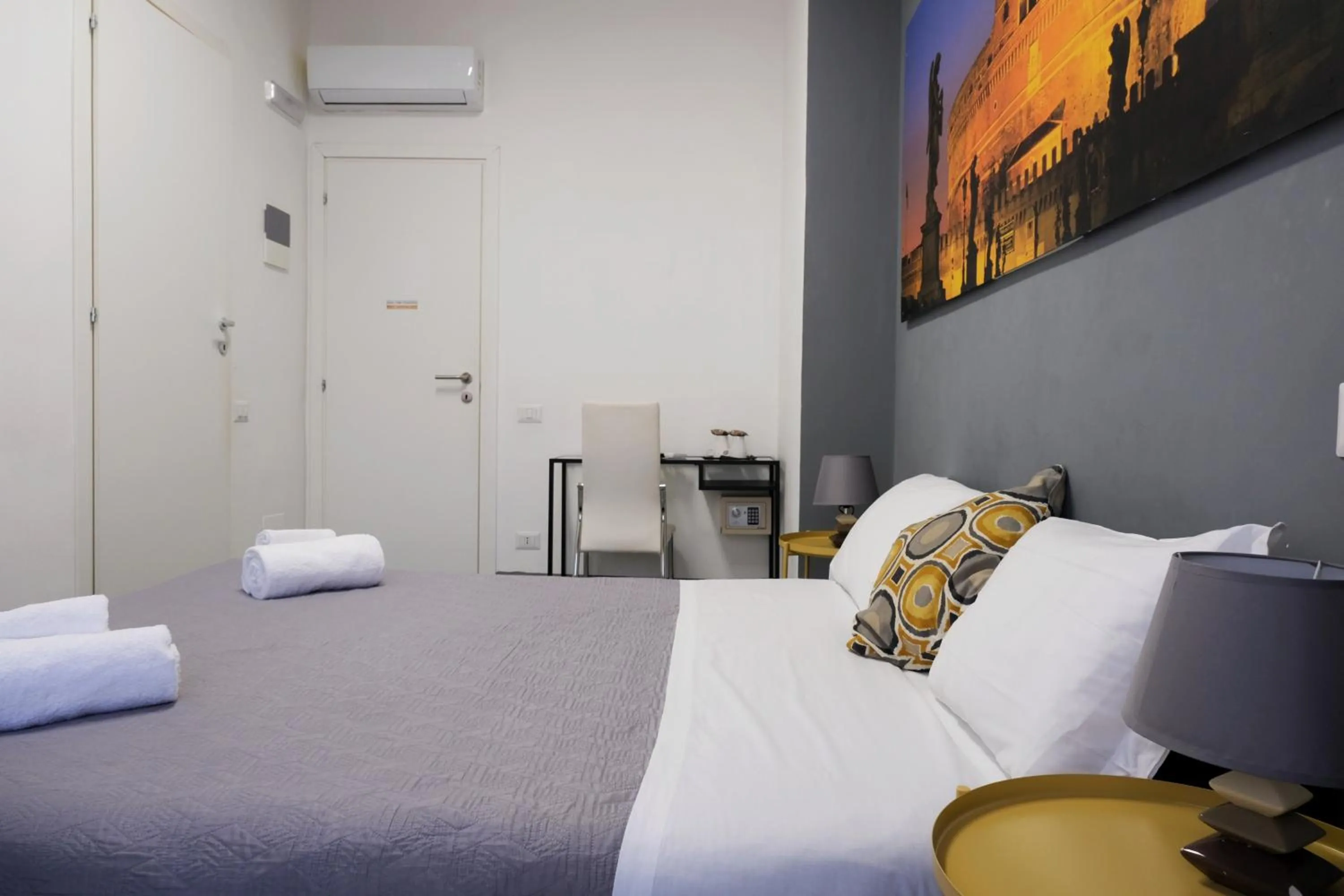 Bed in Vatican Central Suites