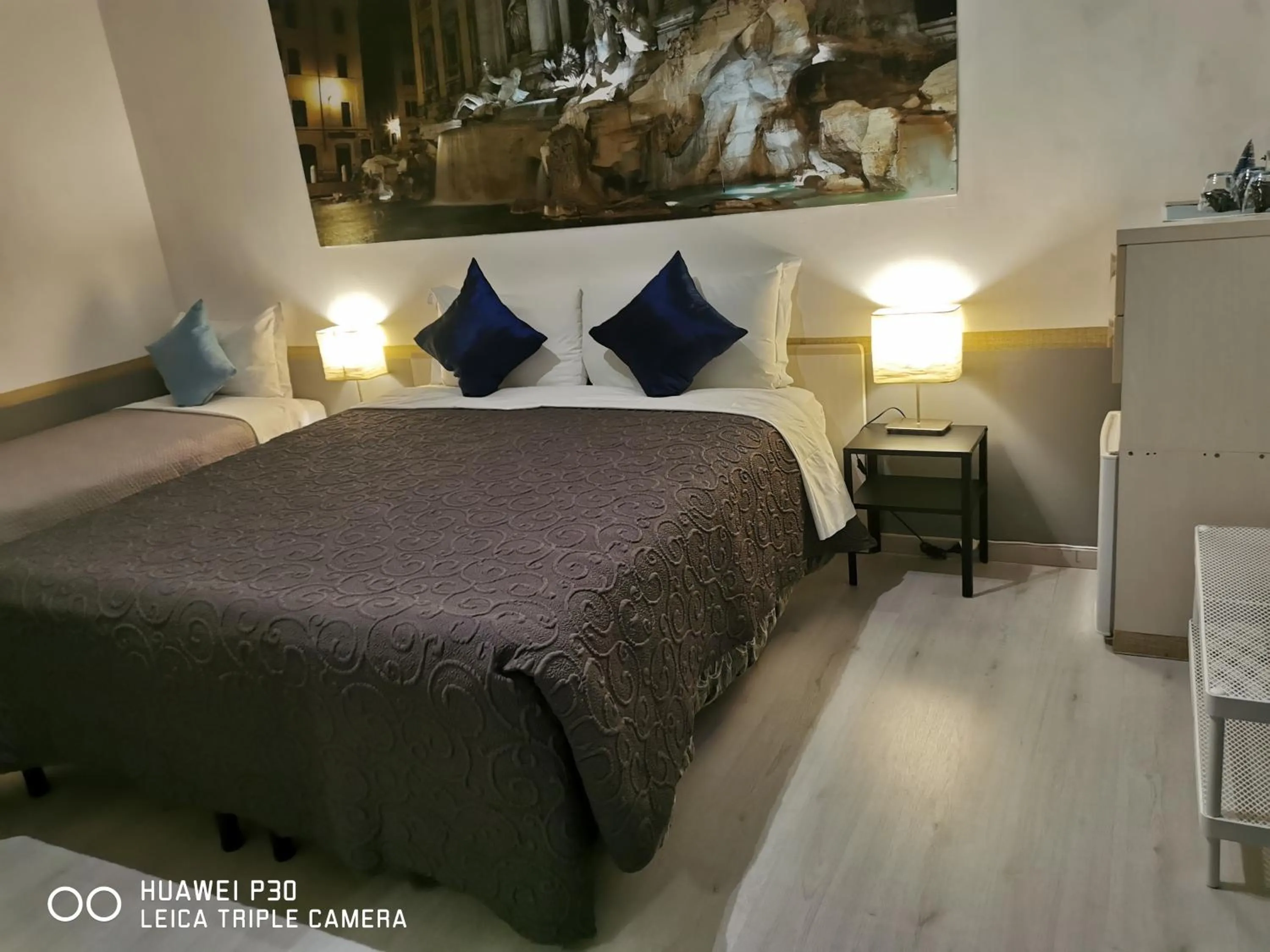 Bed in Vatican Central Suites