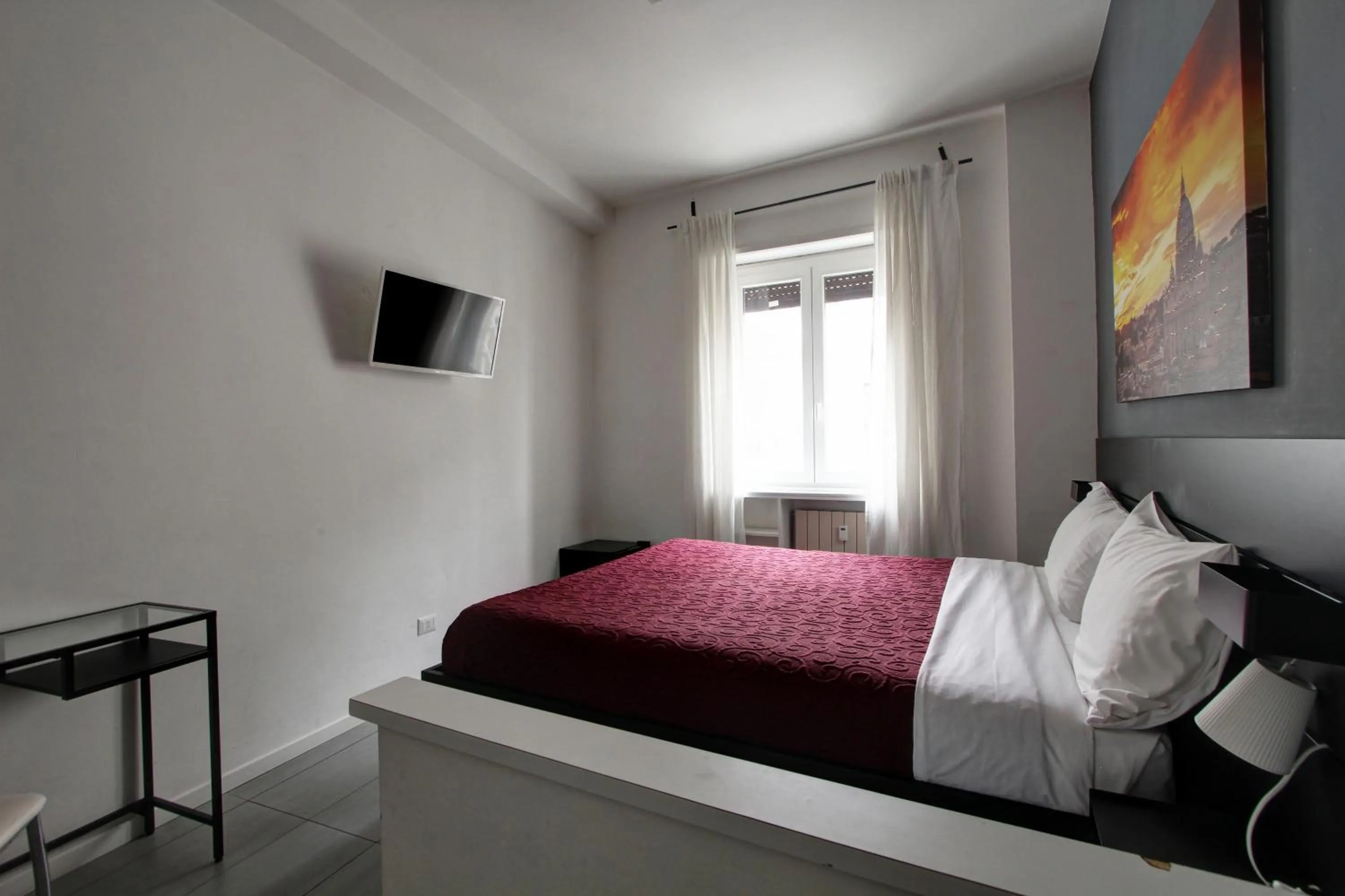 Bed in Vatican Central Suites