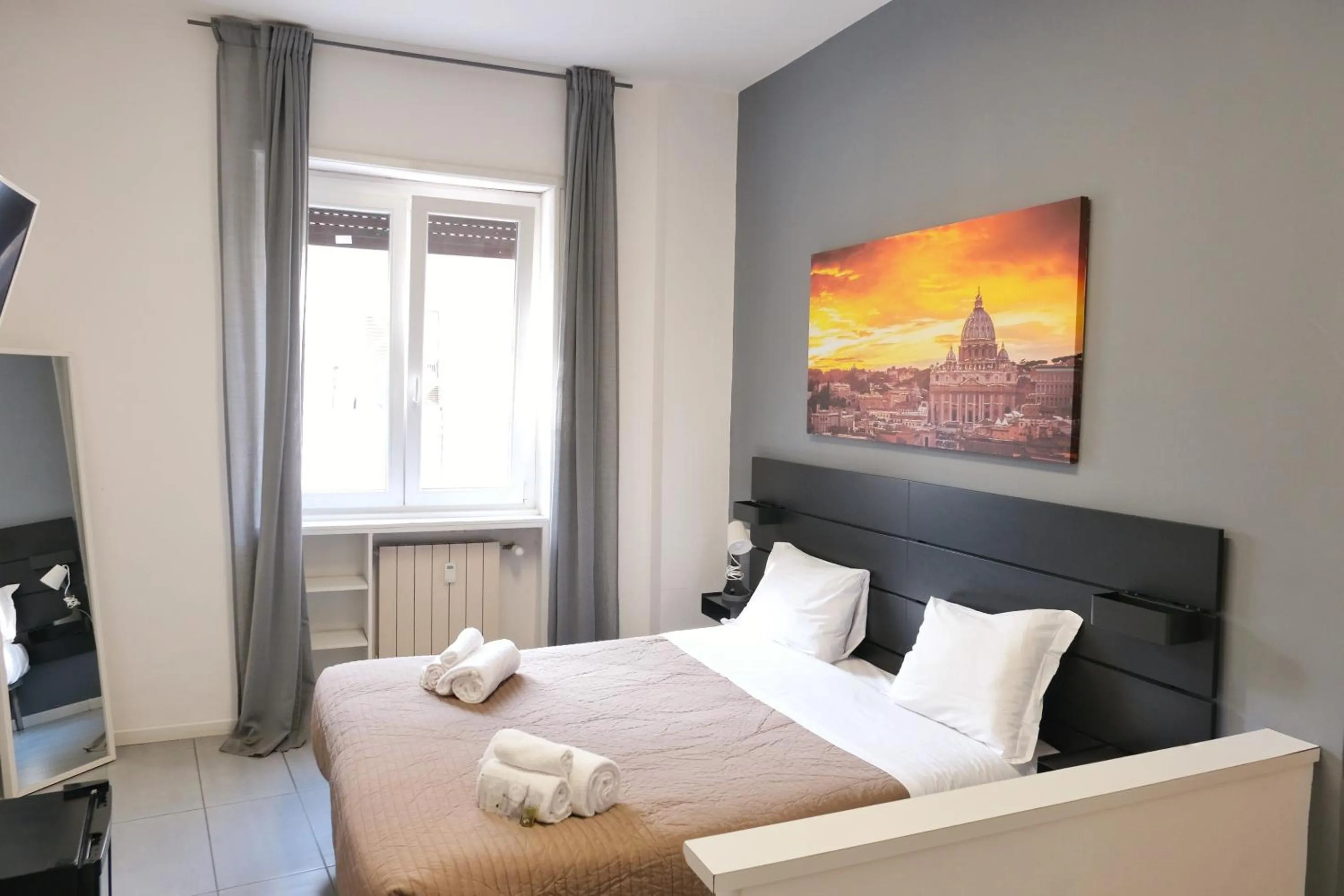 Bed in Vatican Central Suites