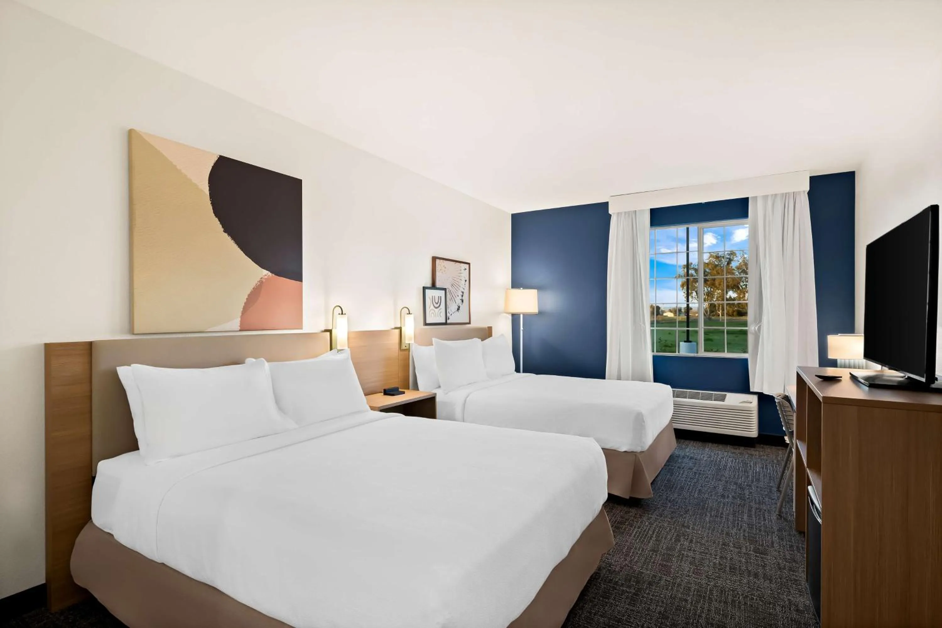 Photo of the whole room, Bed in Spark by Hilton Newest Hotel in Williams CA