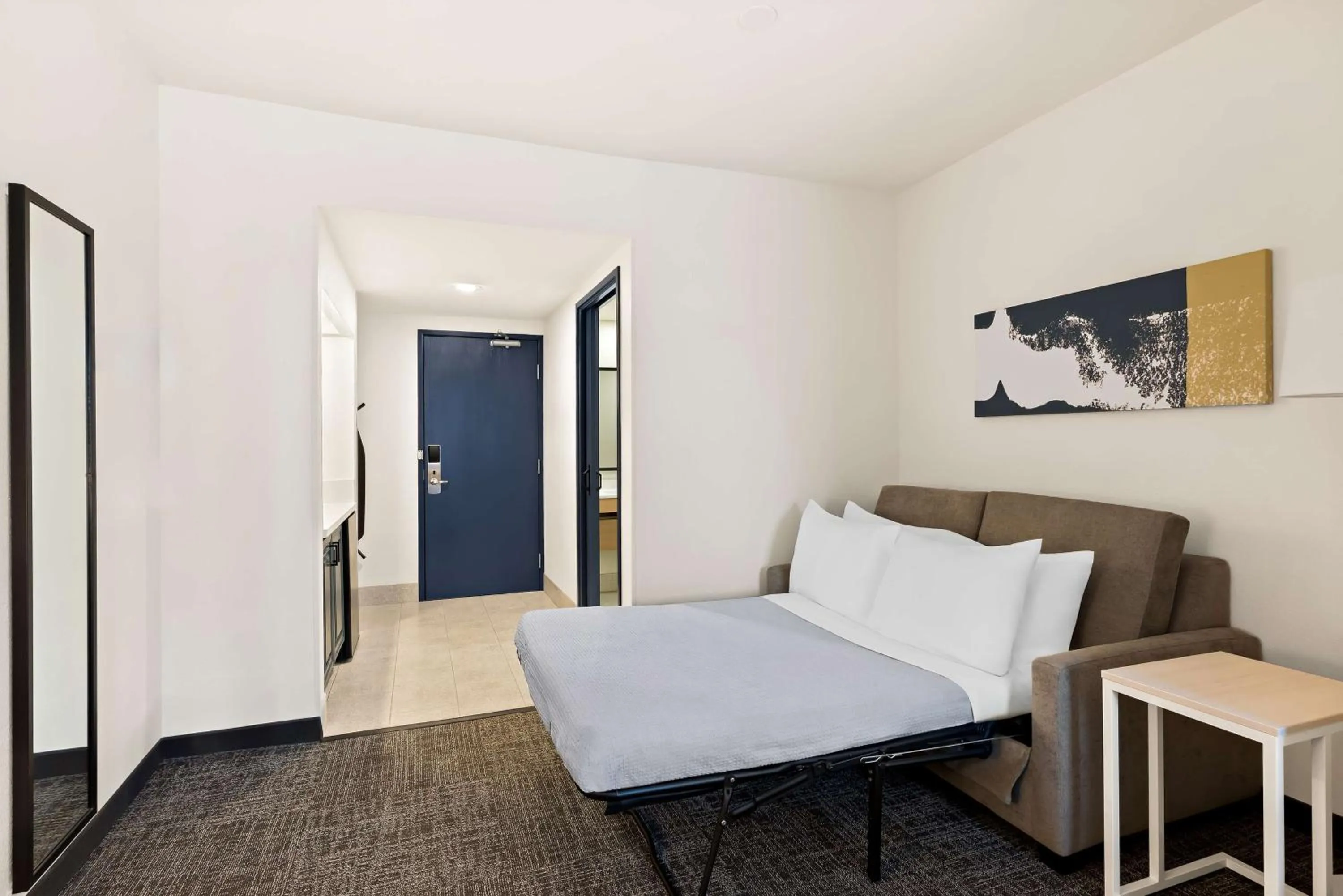 Living room, Bed in Spark by Hilton Newest Hotel in Williams CA