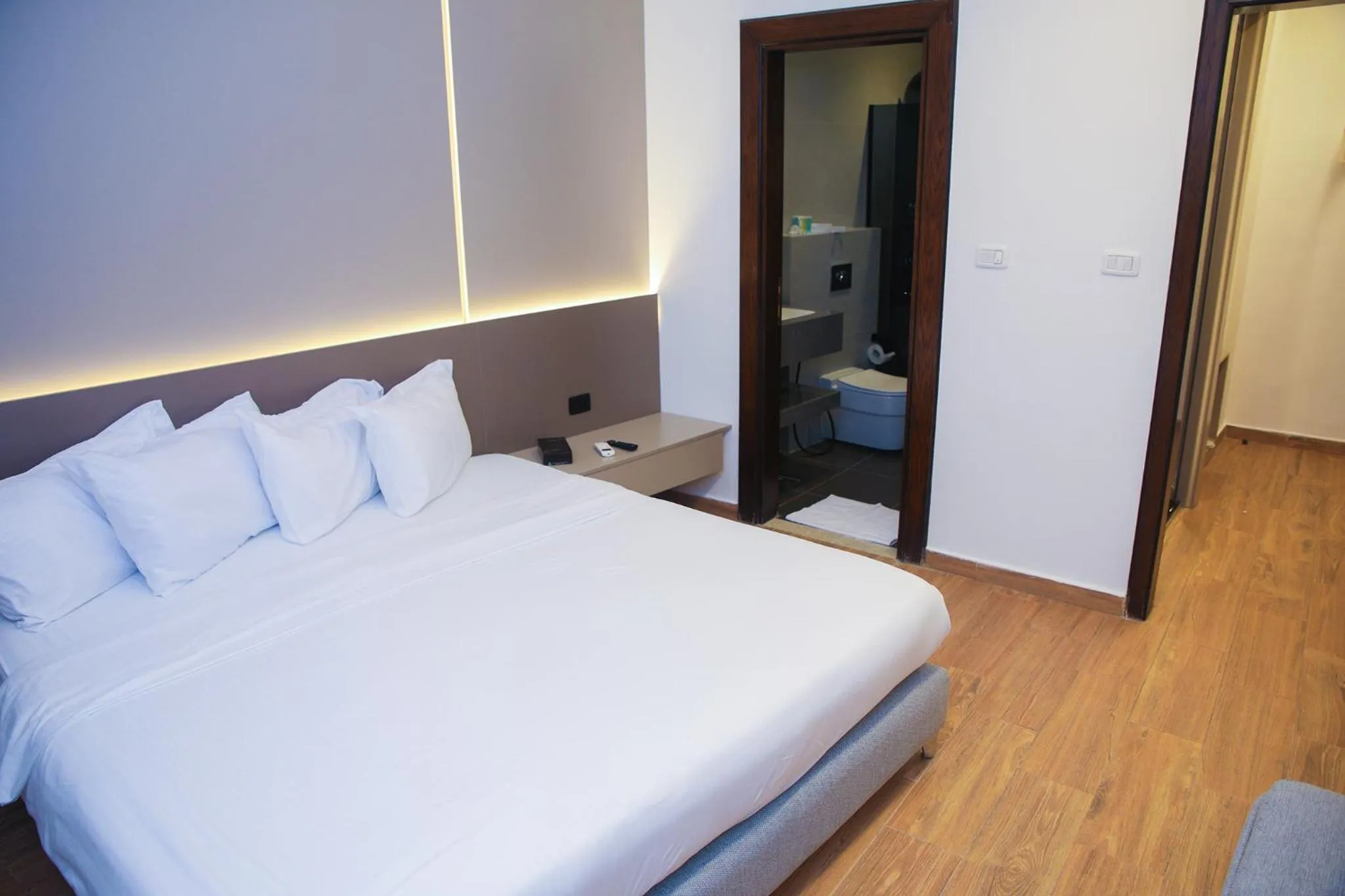 Bed in Spark Plaza Hotel