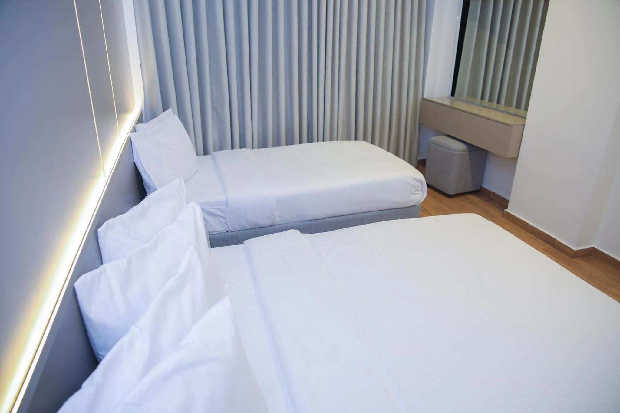 Bed in Spark Plaza Hotel