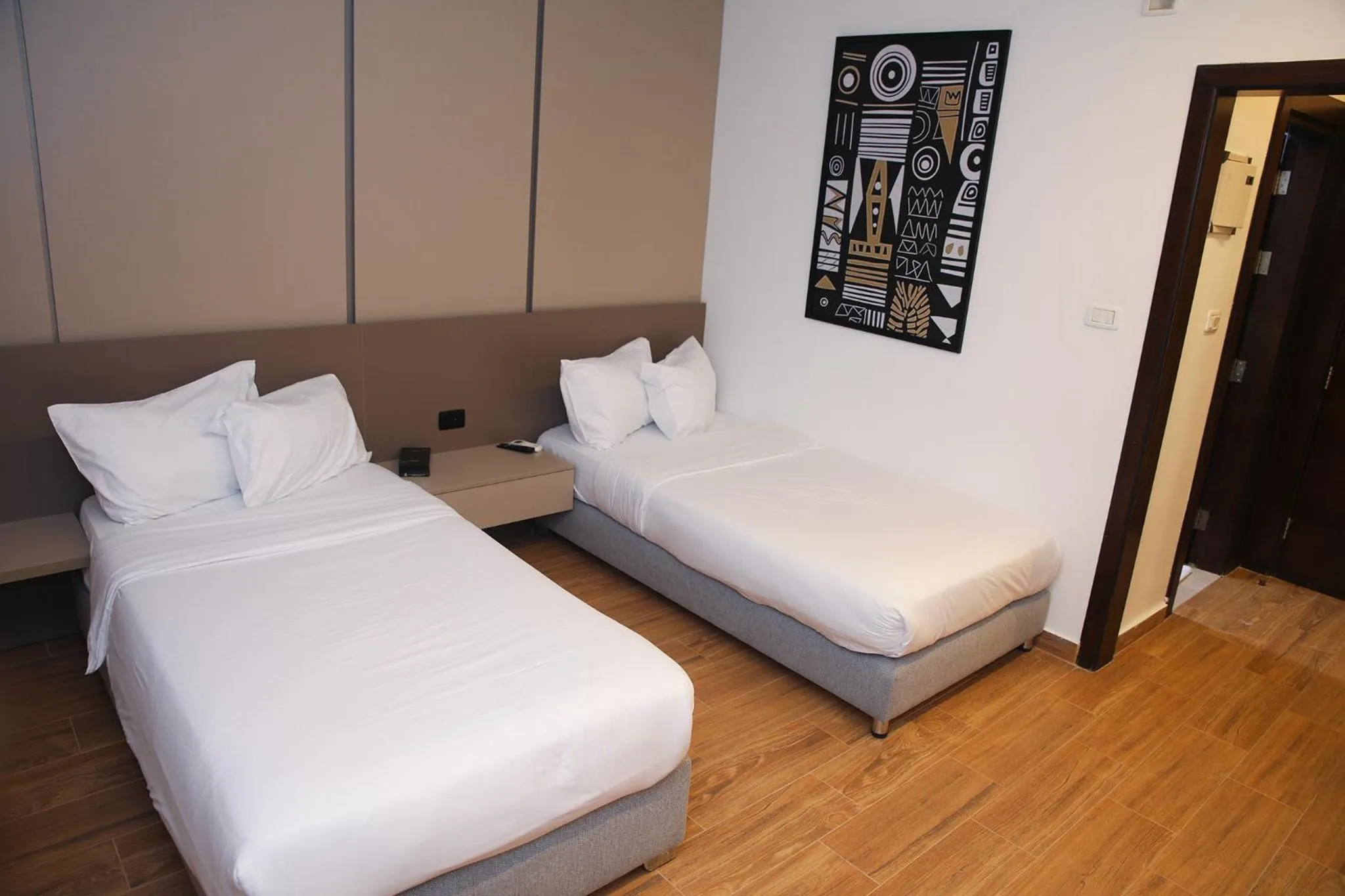 Bed in Spark Plaza Hotel