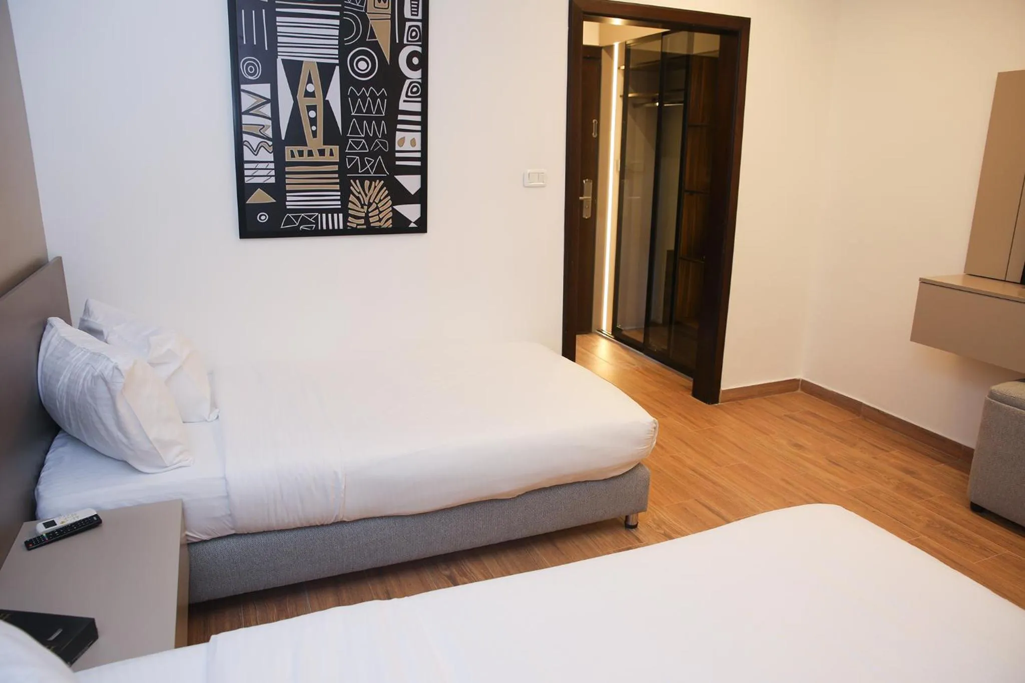 Bed in Spark Plaza Hotel