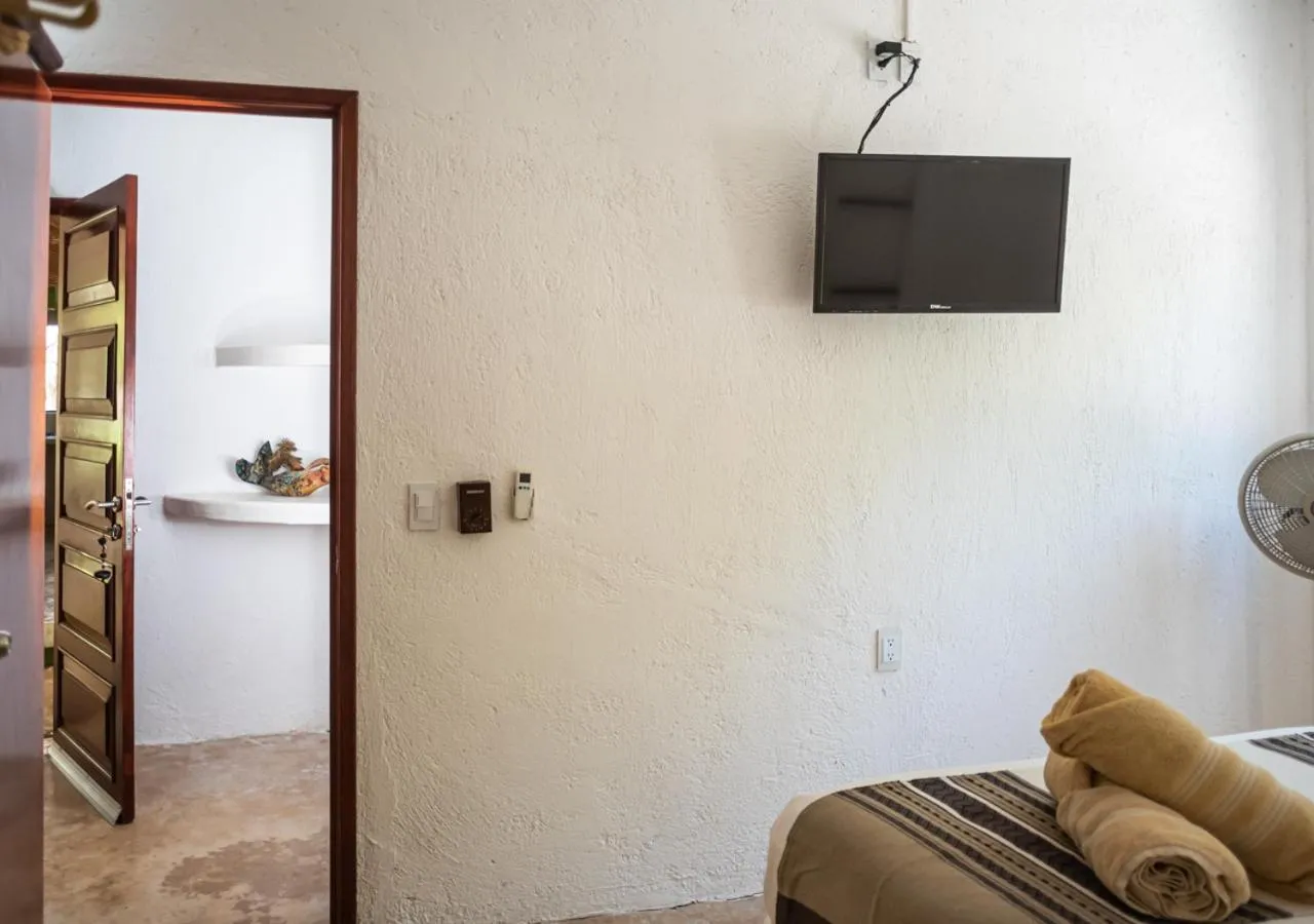 Bed in Villa Los Mangles Boutique Hotel