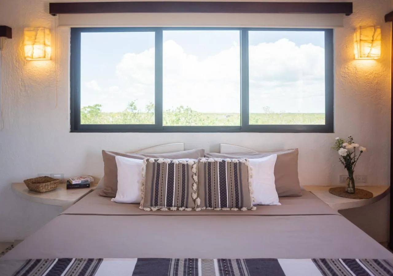 Bed in Villa Los Mangles Boutique Hotel