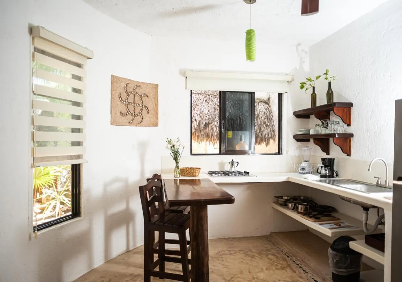 Kitchen or kitchenette in Villa Los Mangles Boutique Hotel