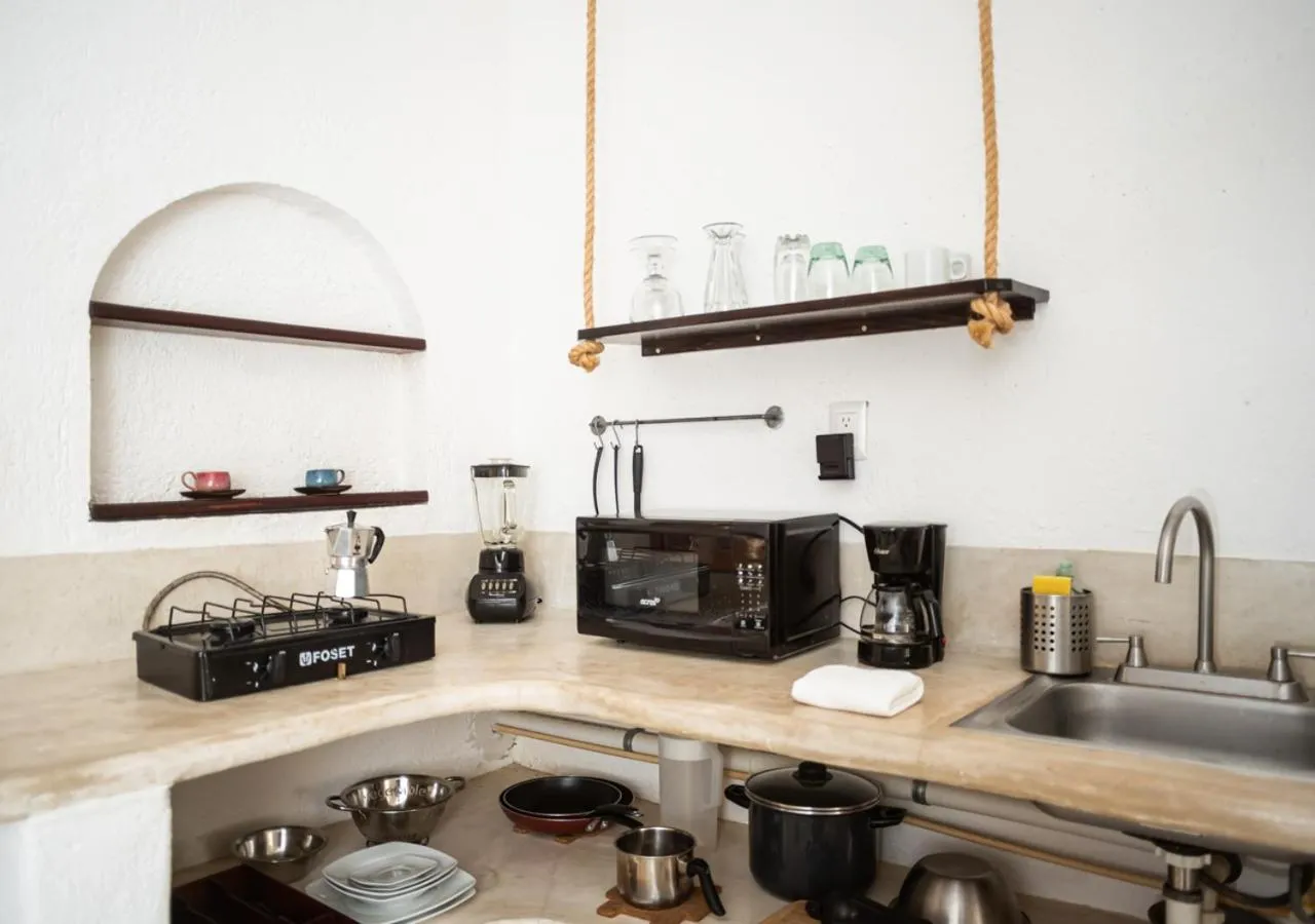 Kitchen or kitchenette in Villa Los Mangles Boutique Hotel