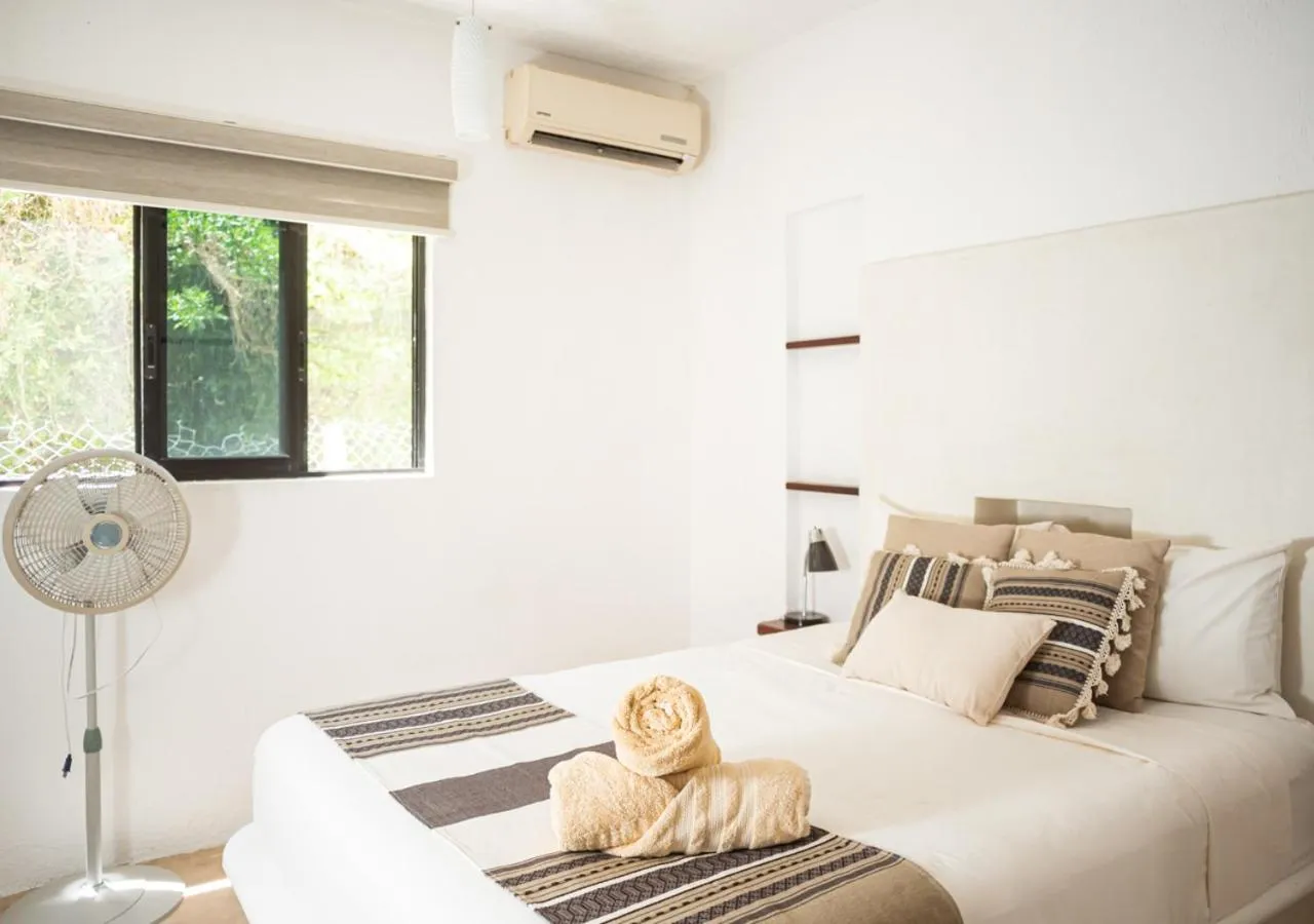 Bed in Villa Los Mangles Boutique Hotel