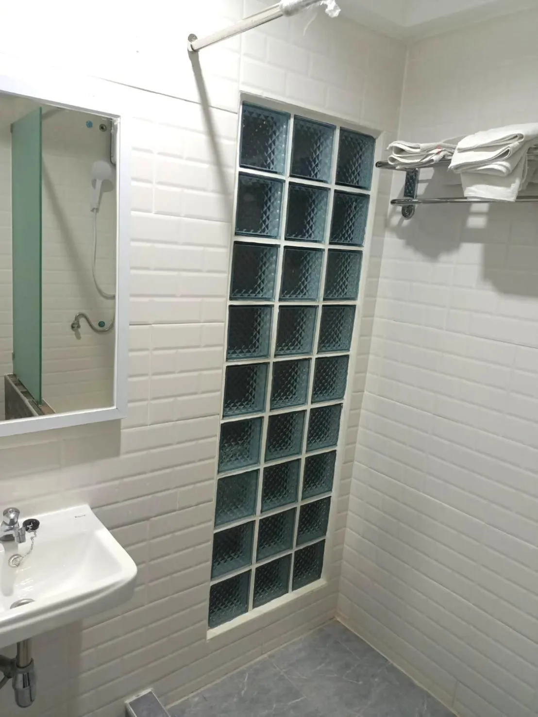 Bathroom in Royal Garden Home Hotel