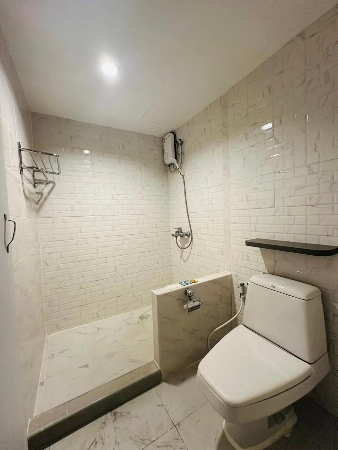 Bathroom in Royal Garden Home Hotel