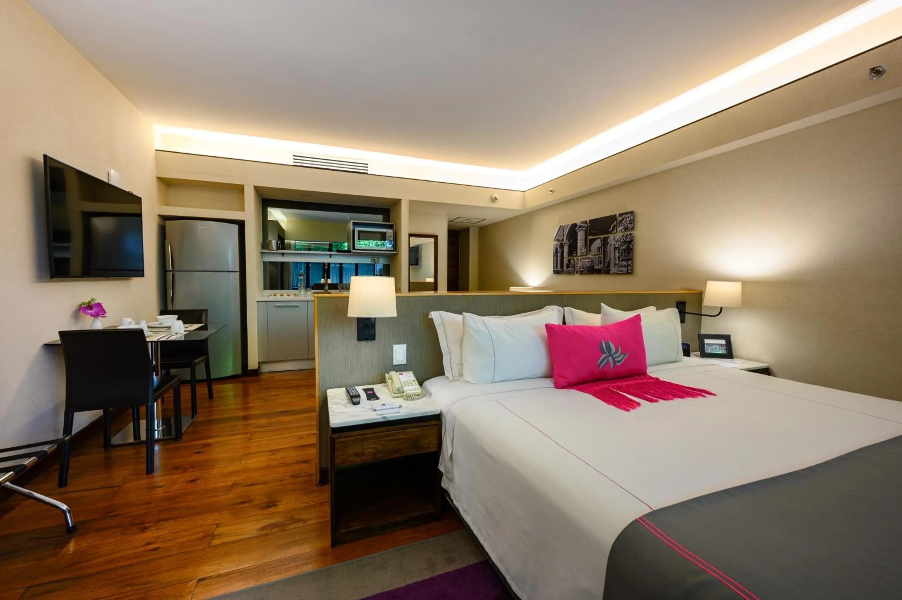 Bed in Las Suites Campos Eliseos