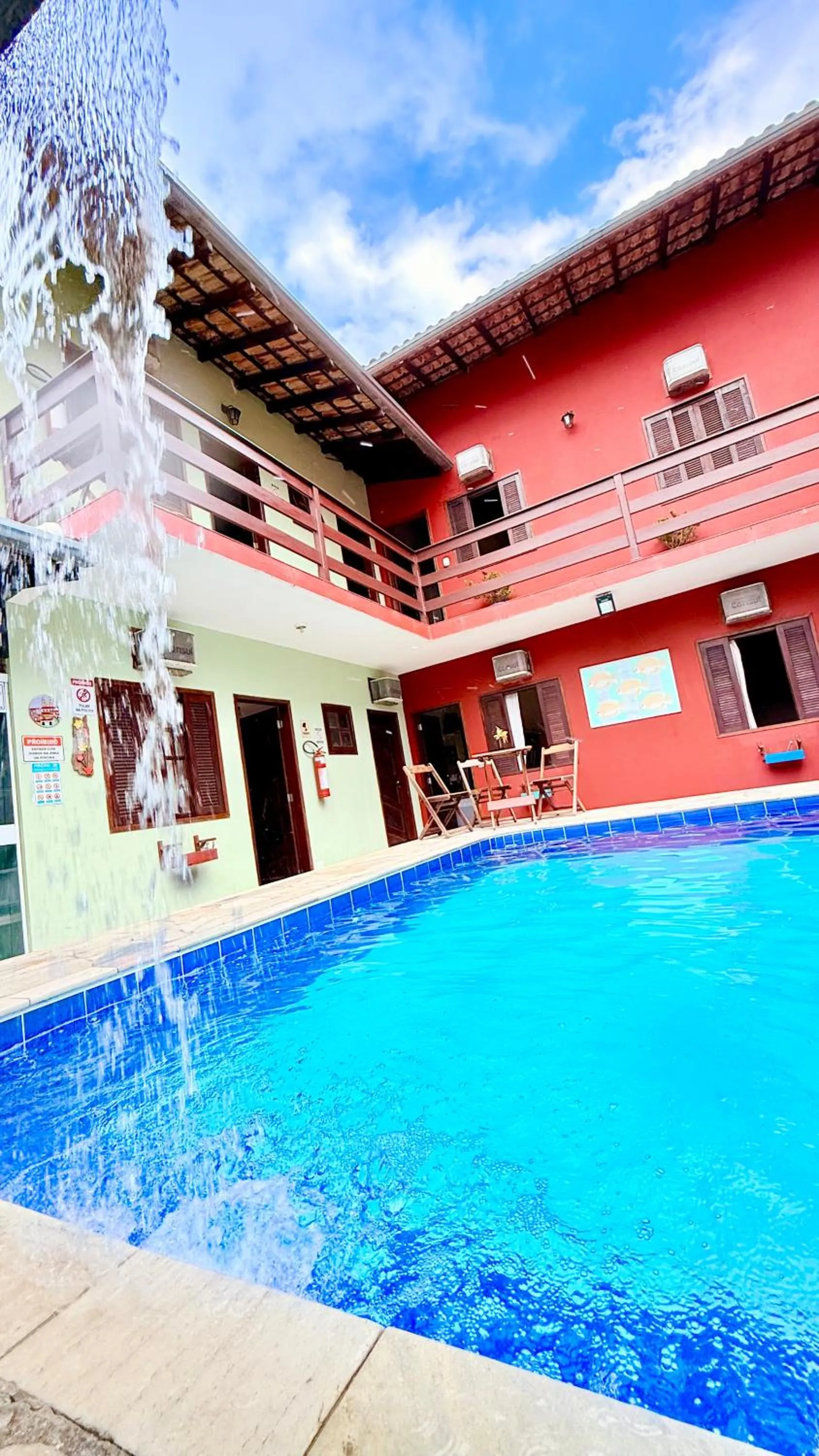 Swimming pool in Pousada Cores Do Mar