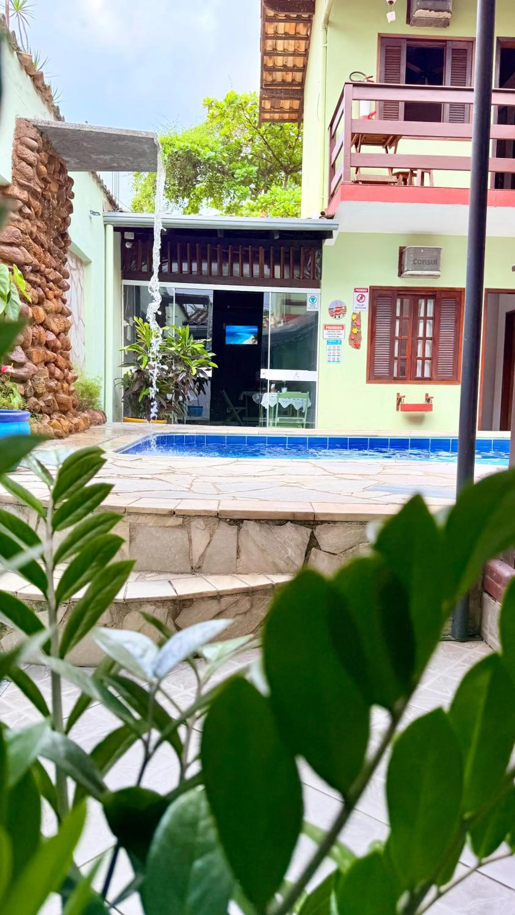 Swimming pool in Pousada Cores Do Mar