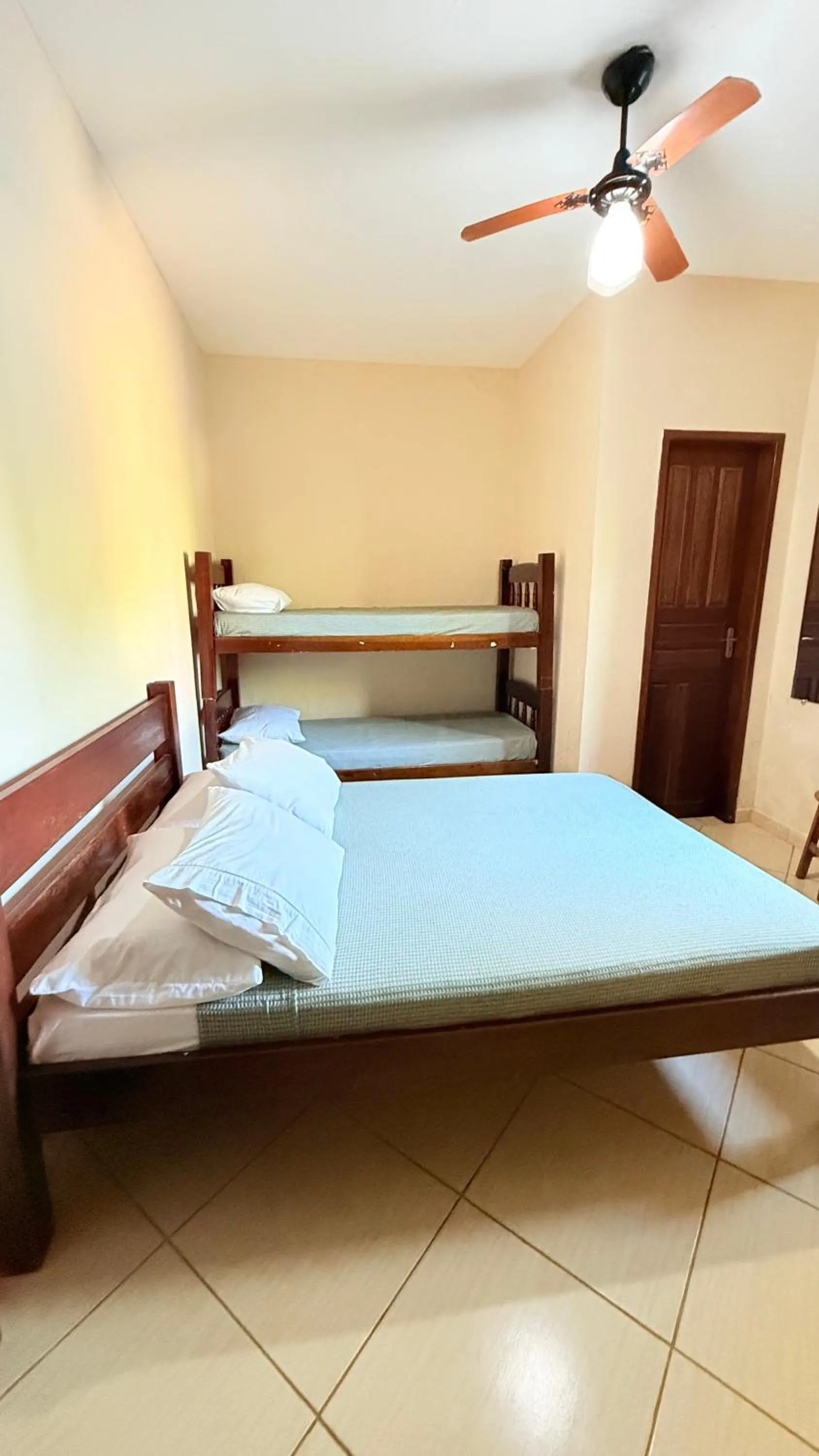 Bed in Pousada Cores Do Mar