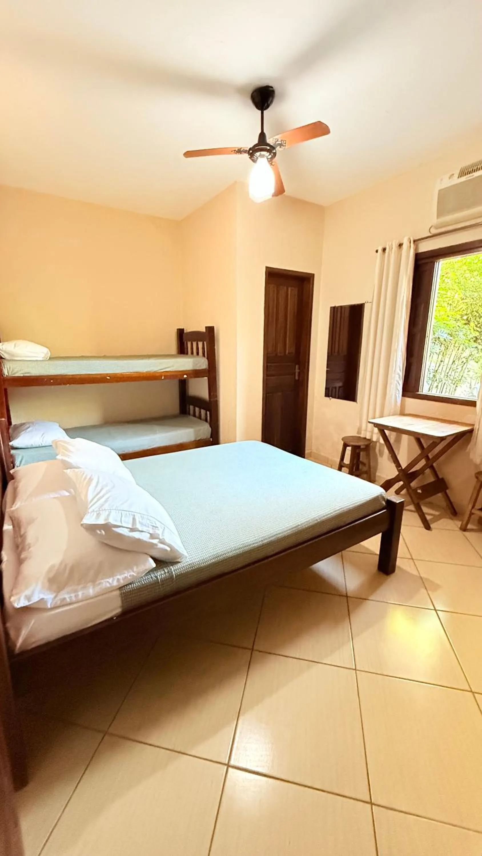 Bed in Pousada Cores Do Mar