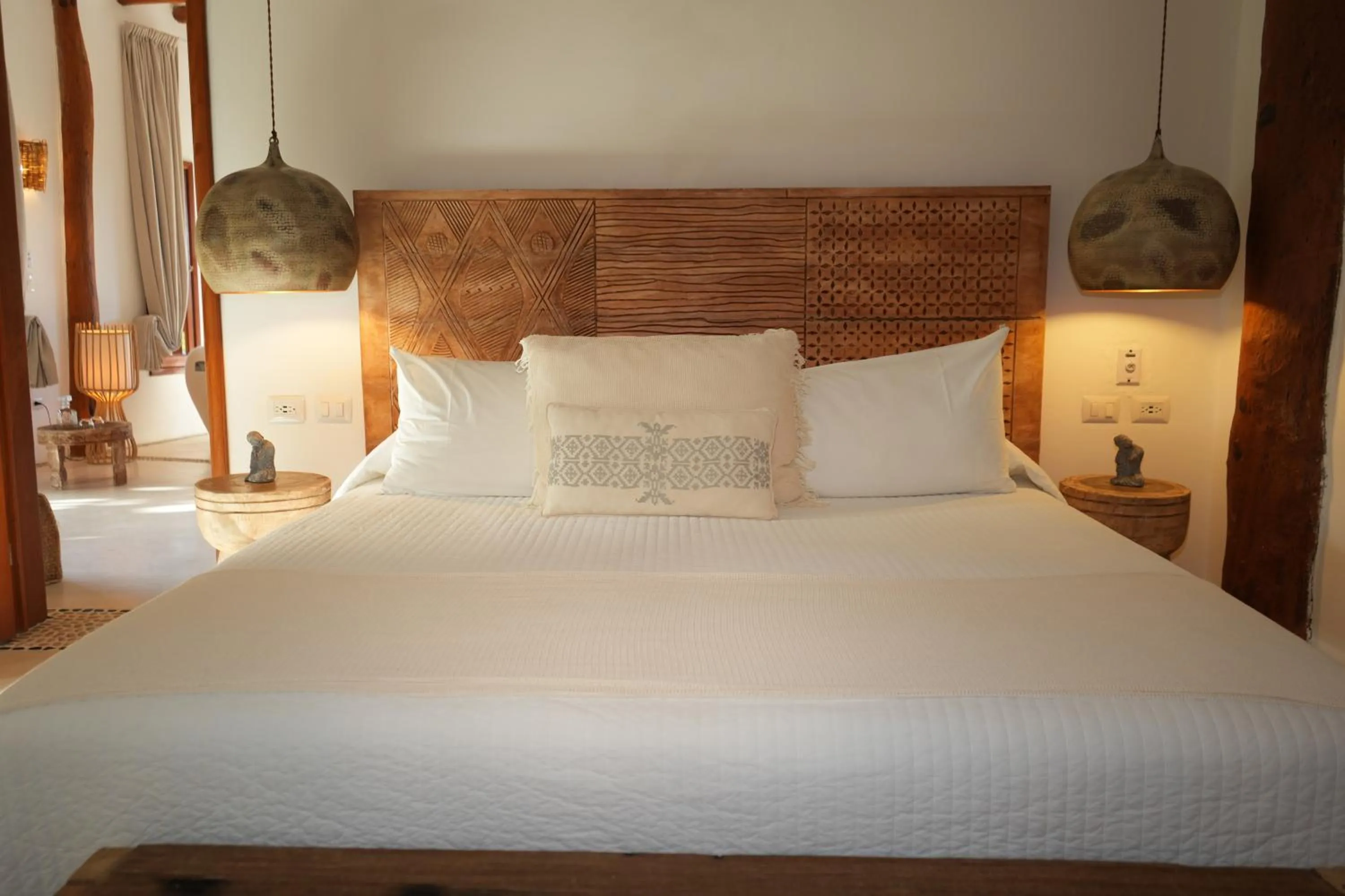 Bed in Casa Las Tortugas Petit Beach Hotel & Spa