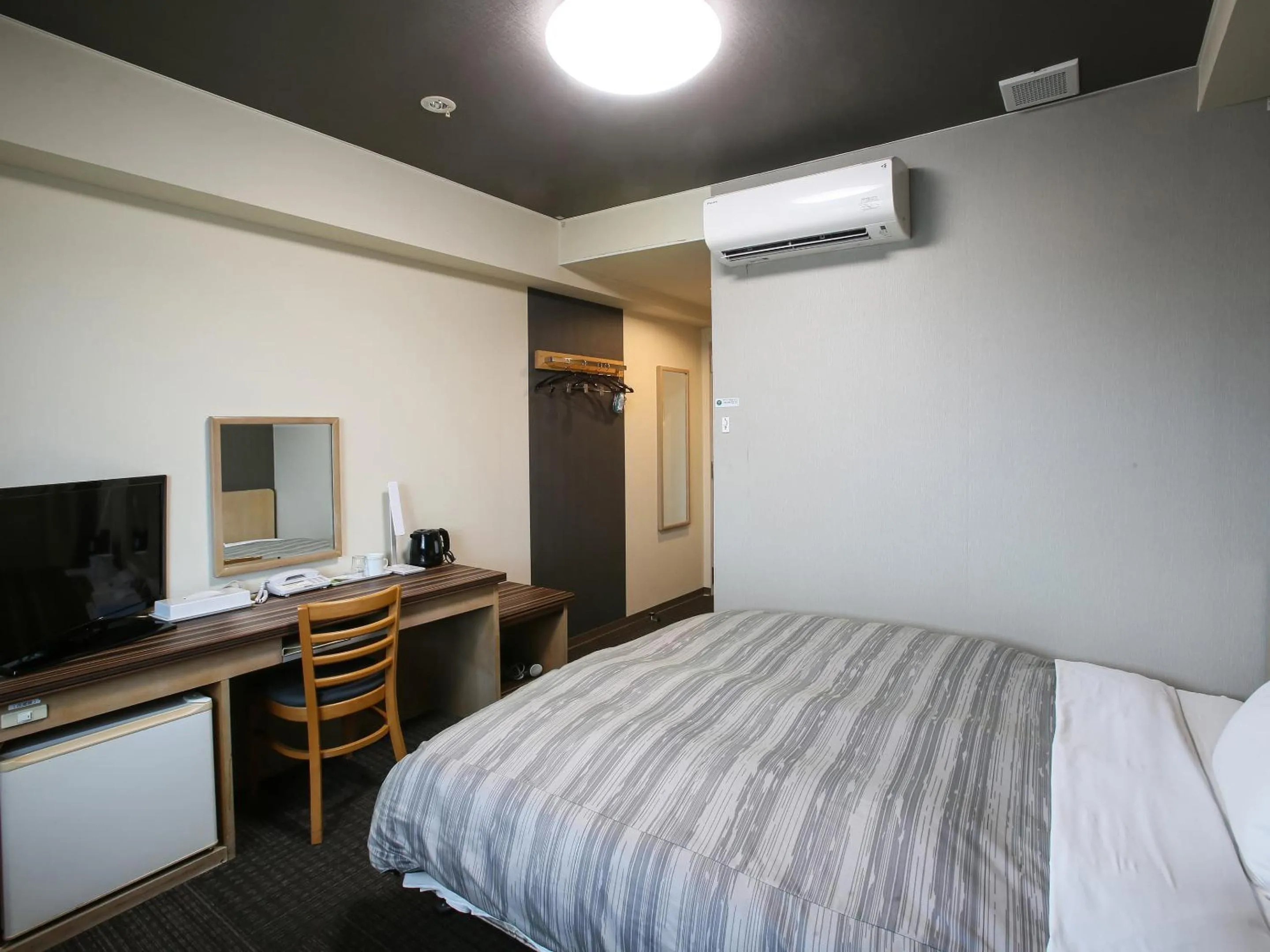 Bed in Route Inn Grantia Ishigaki