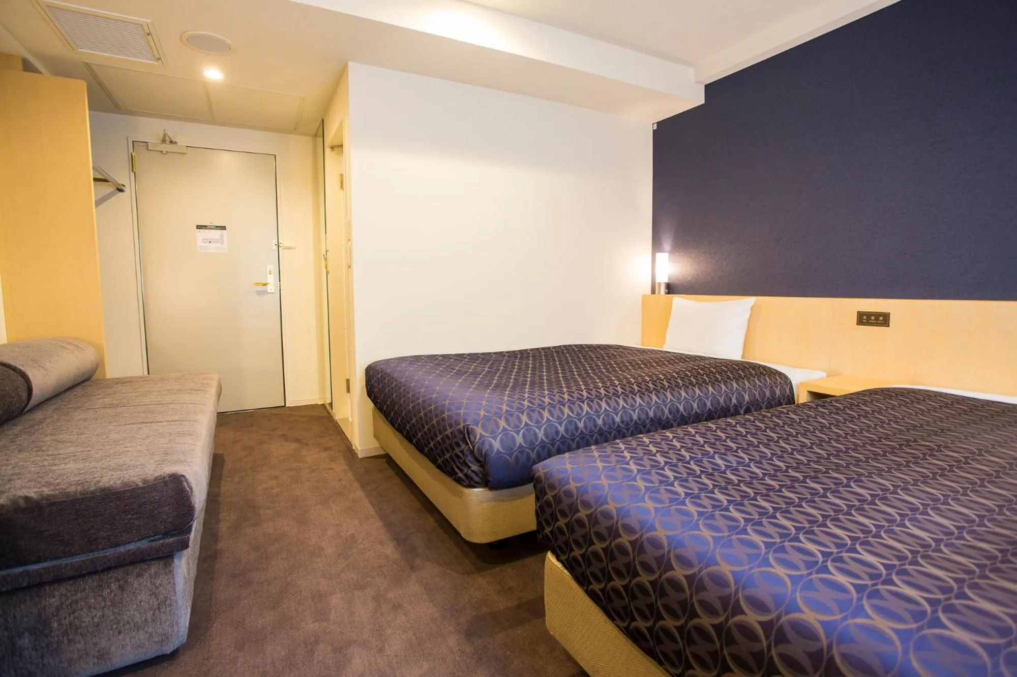 Bed in Hotel Asia Center of Japan