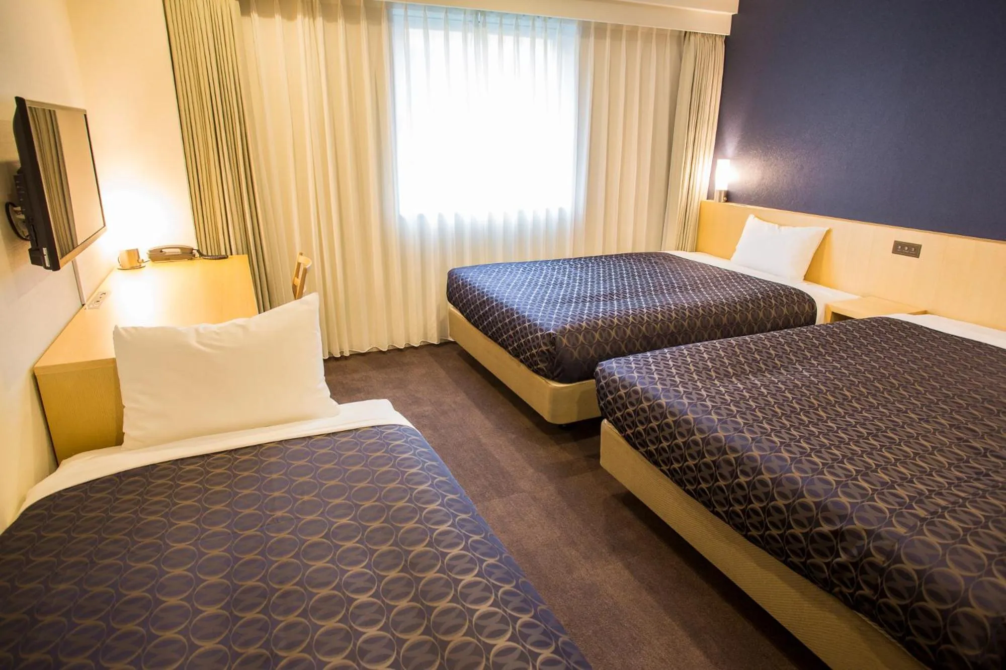 Bed in Hotel Asia Center of Japan