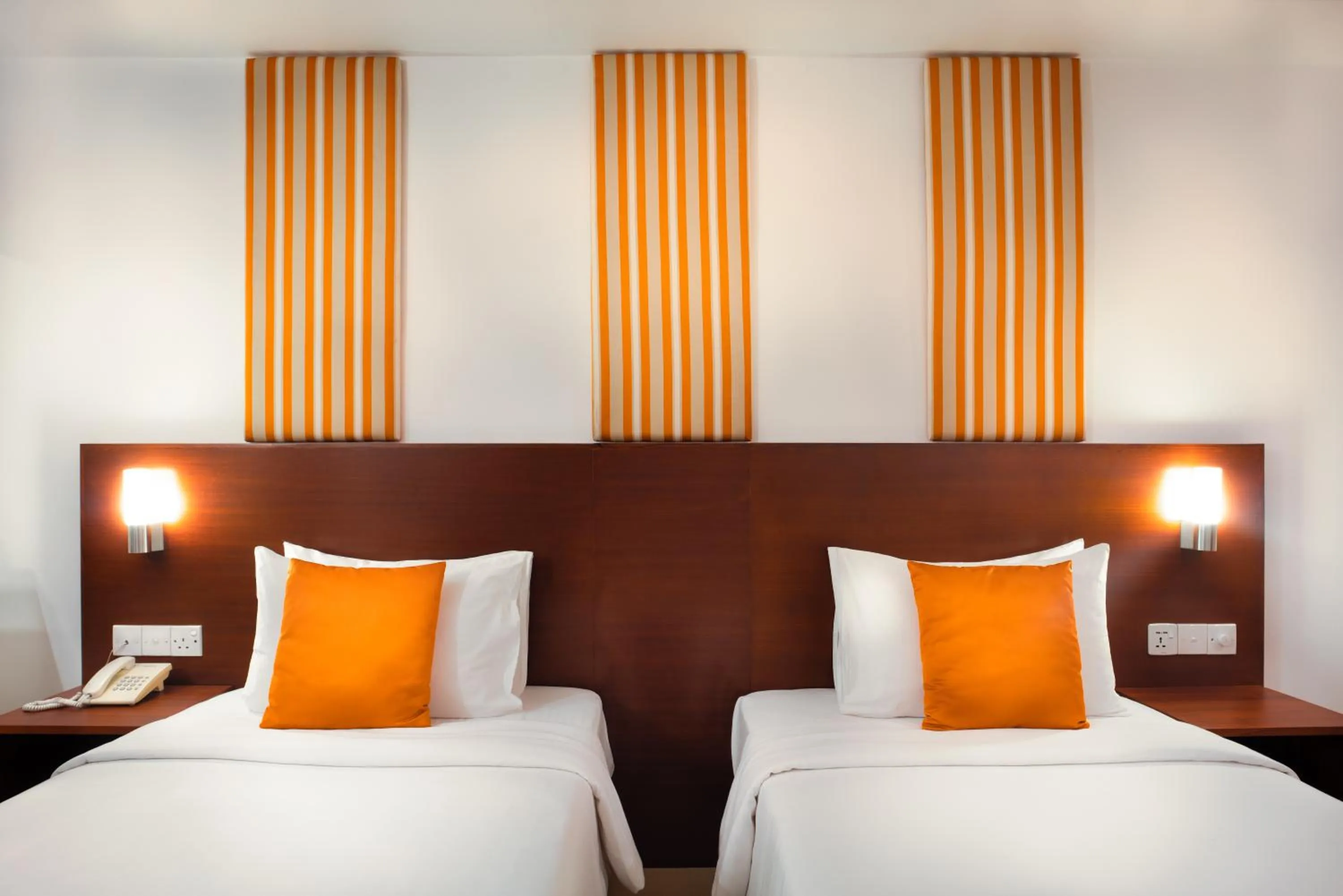 Bed in Camelot Beach Hotel