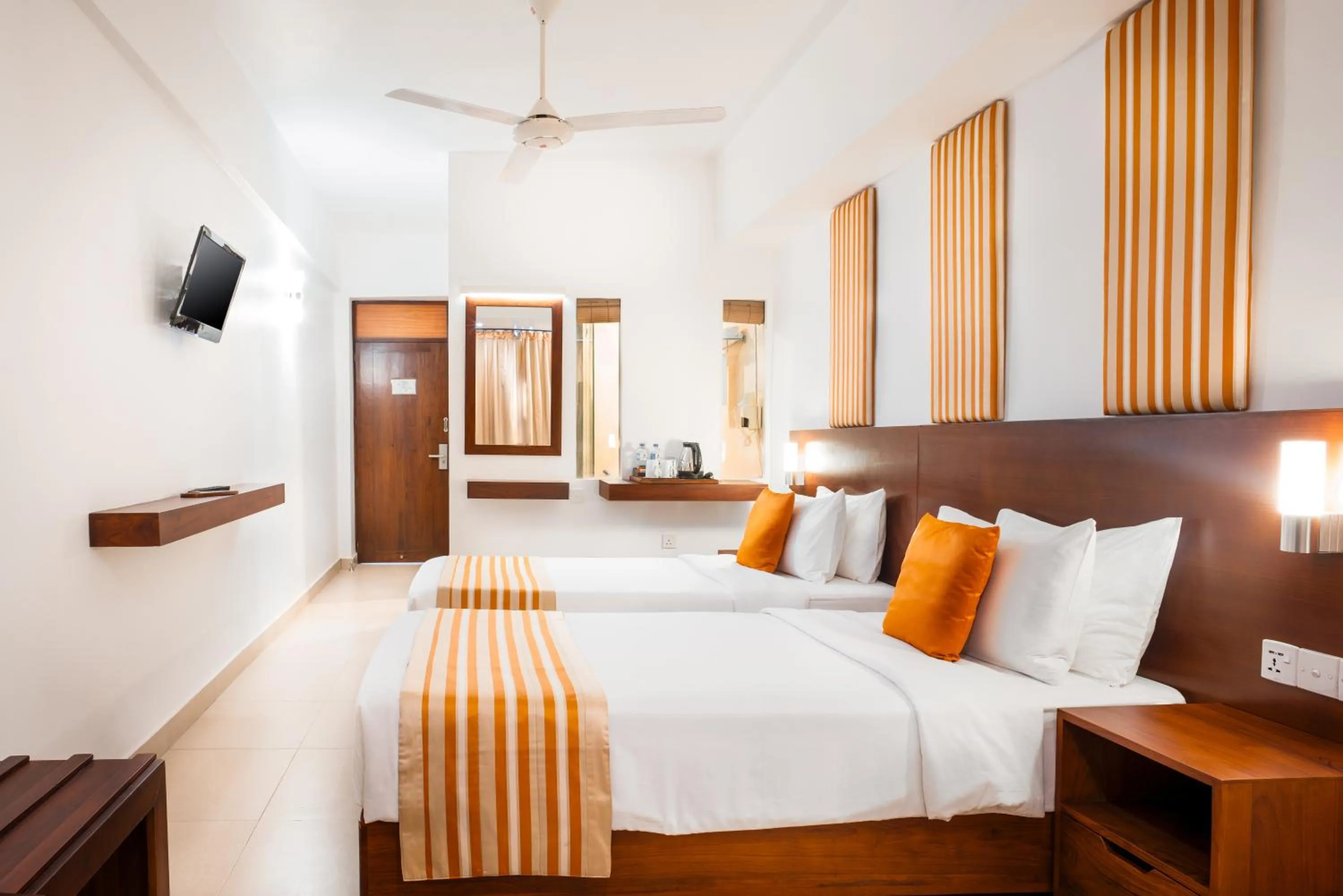 Bed in Camelot Beach Hotel