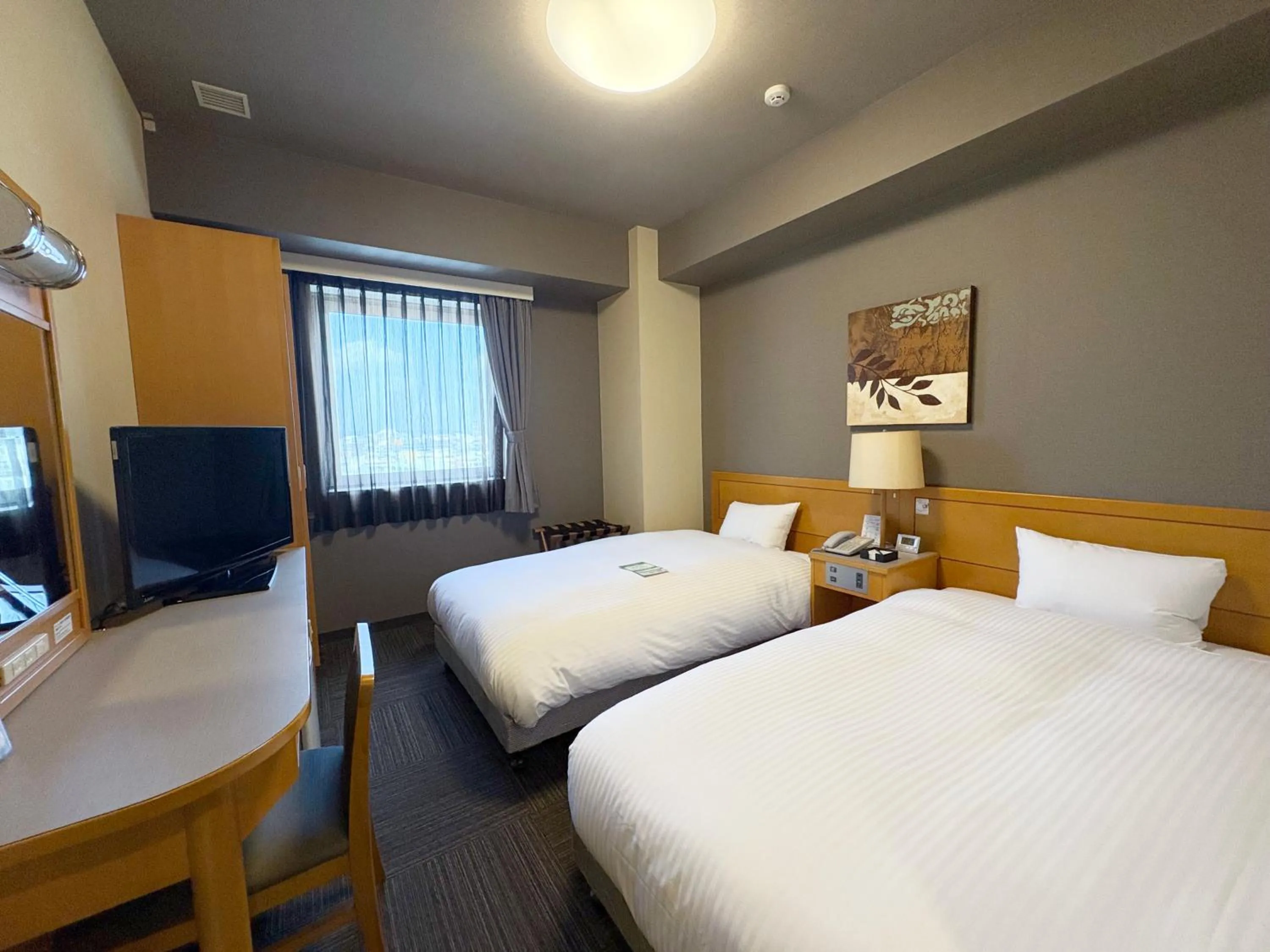 Photo of the whole room, Bed in Hotel Route-Inn Nago