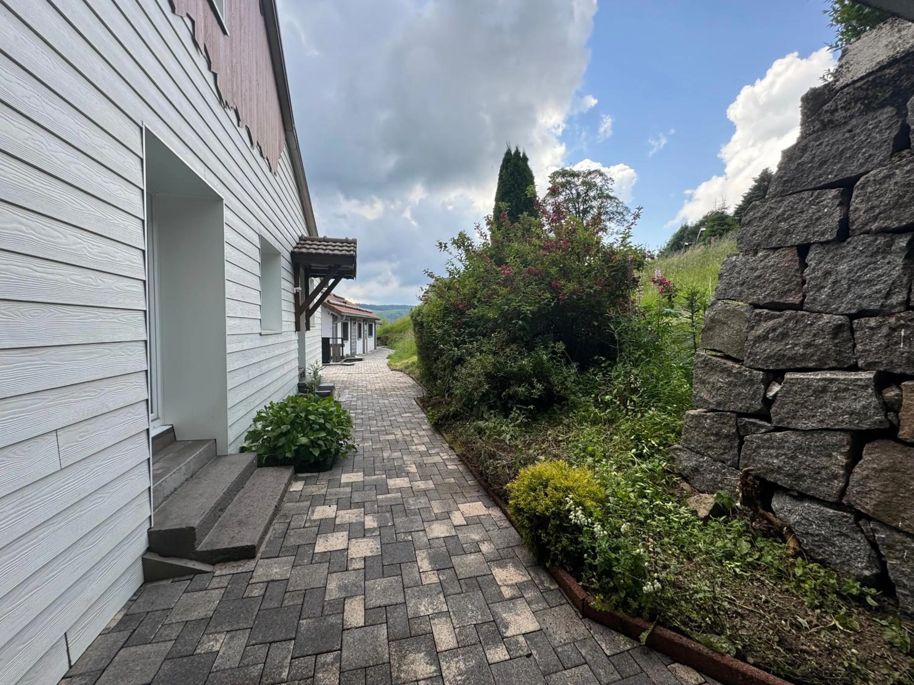 Garden in Hôtel - Restaurant Le Couchetat