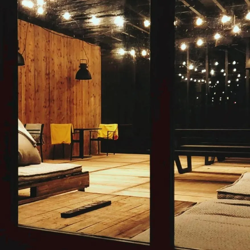 Communal lounge/ TV room in B&B Lisdodde