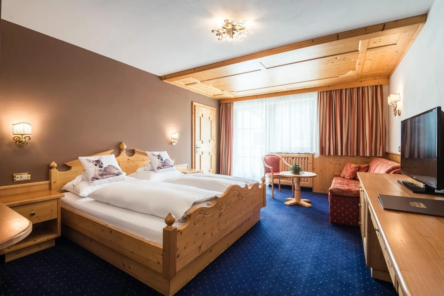 Bed in Alpenhotel Plaza