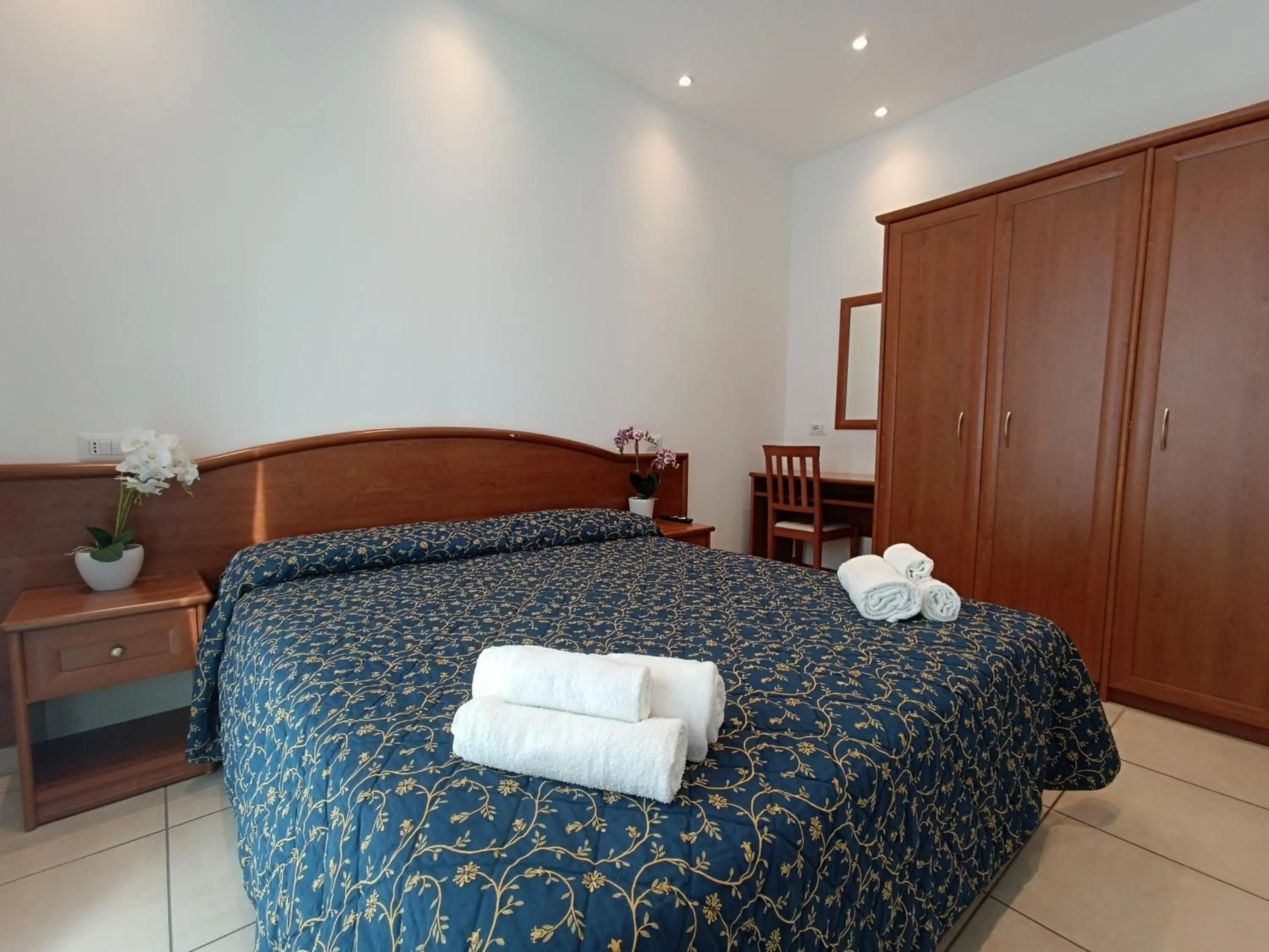 Bed in Hotel Queen Mary