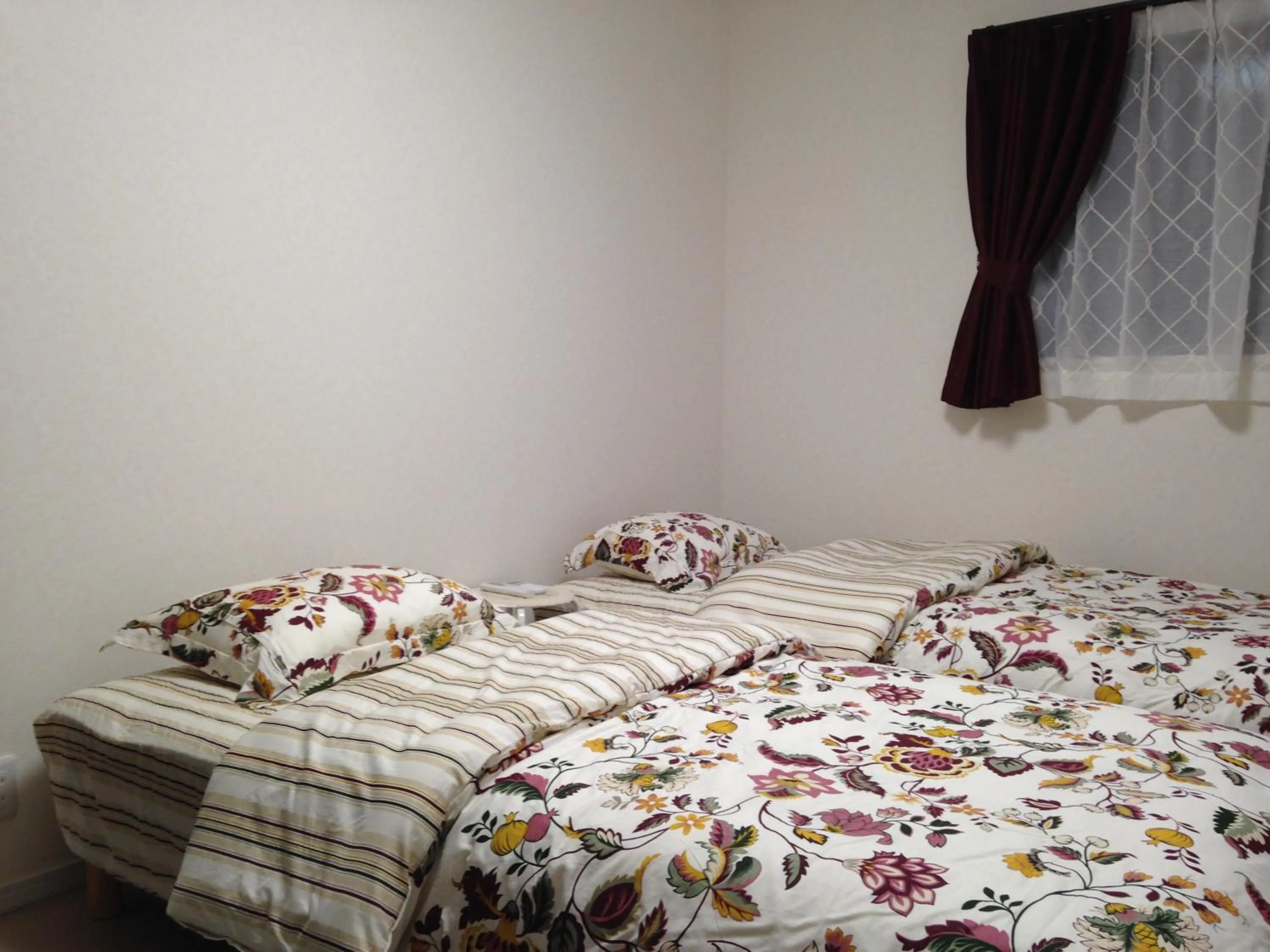 Bed in Nara Guesthouse Kaede