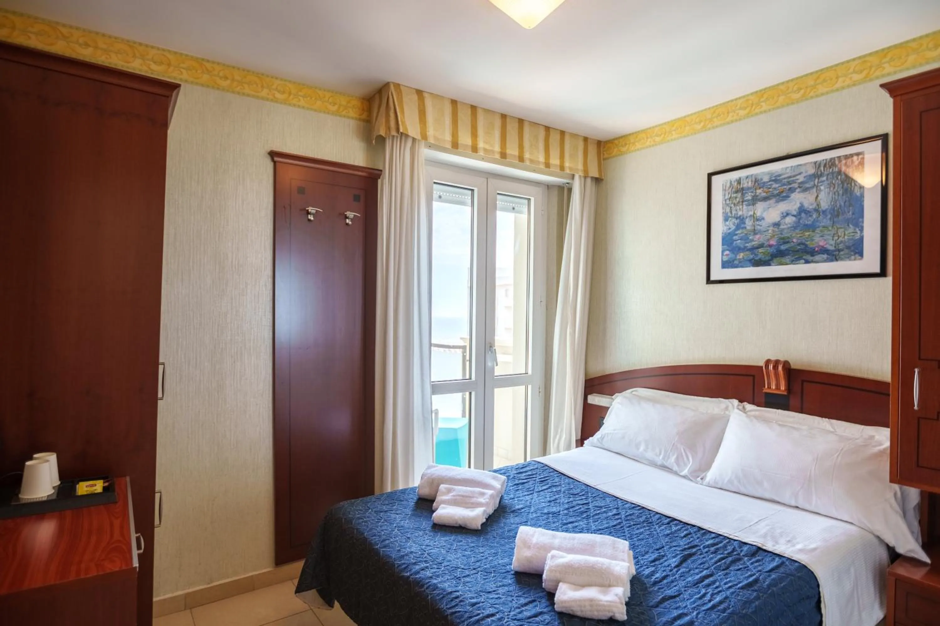 Bed in Hotel Rex Rimini