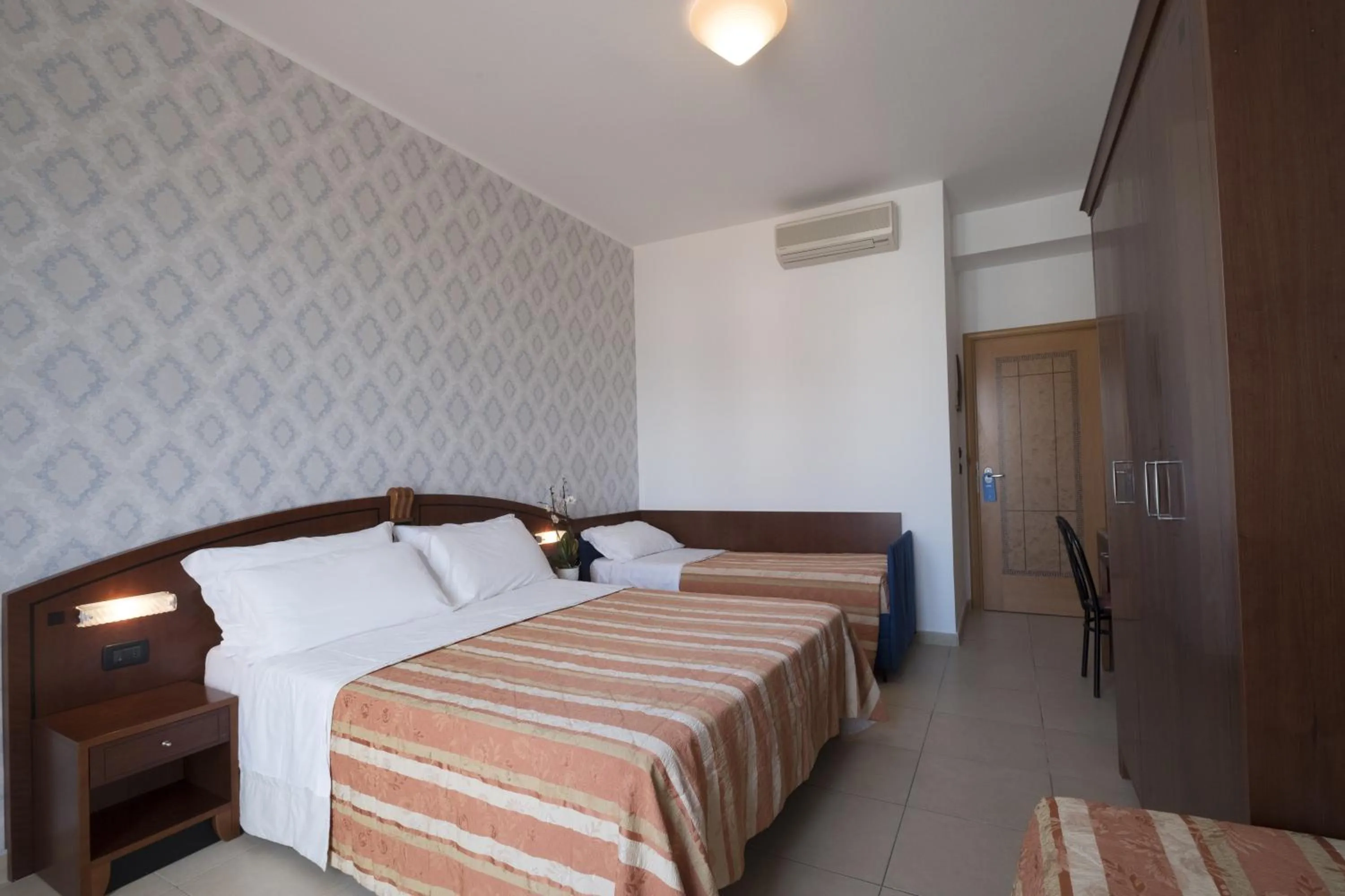 Bed in Hotel Rex Rimini