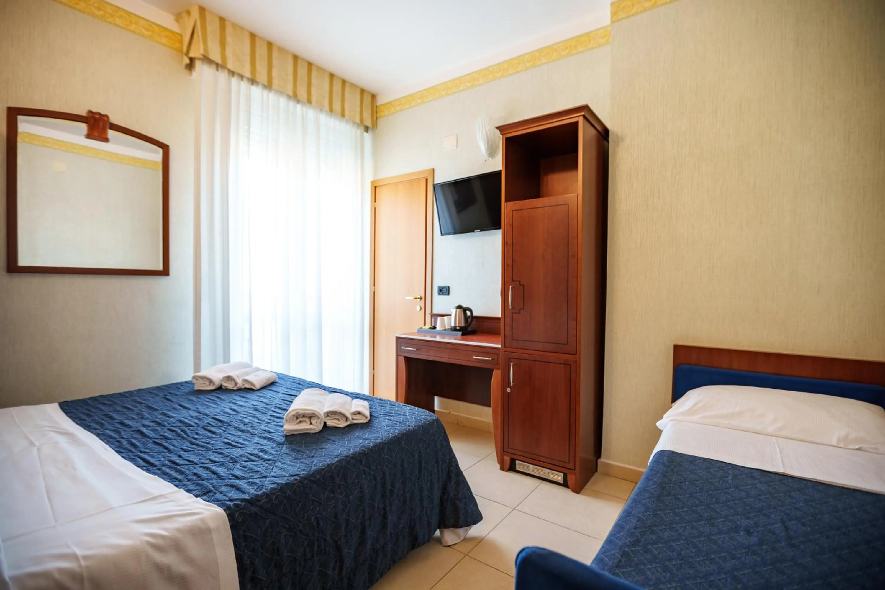 Bed in Hotel Rex Rimini