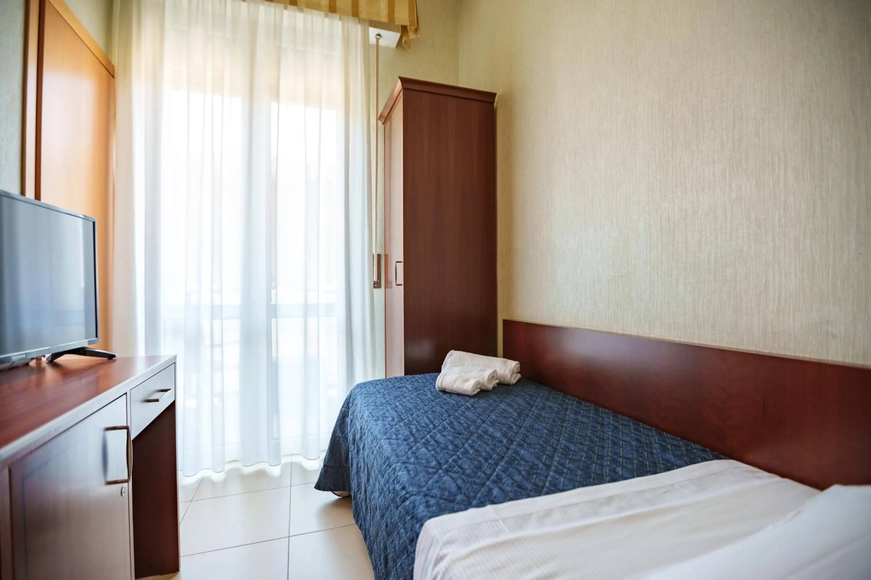 Bed in Hotel Rex Rimini